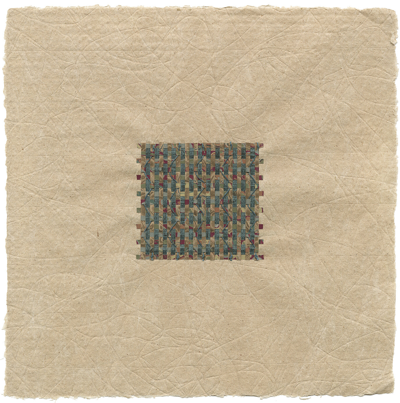 Embossed woven handmade paper. Turquoise and red.