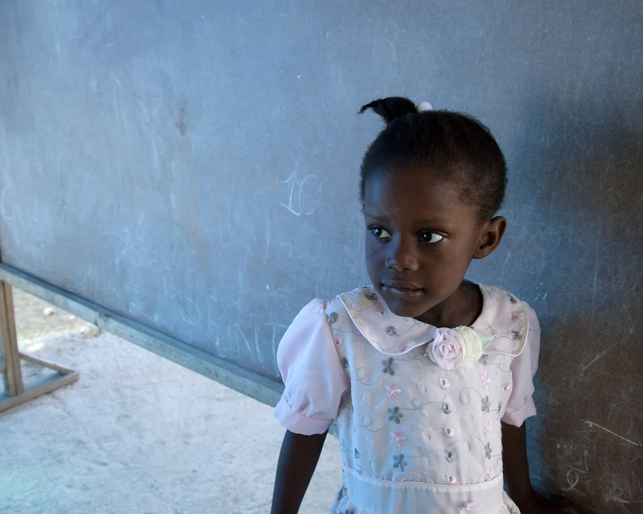 Young girl in outdoor school, Haiti