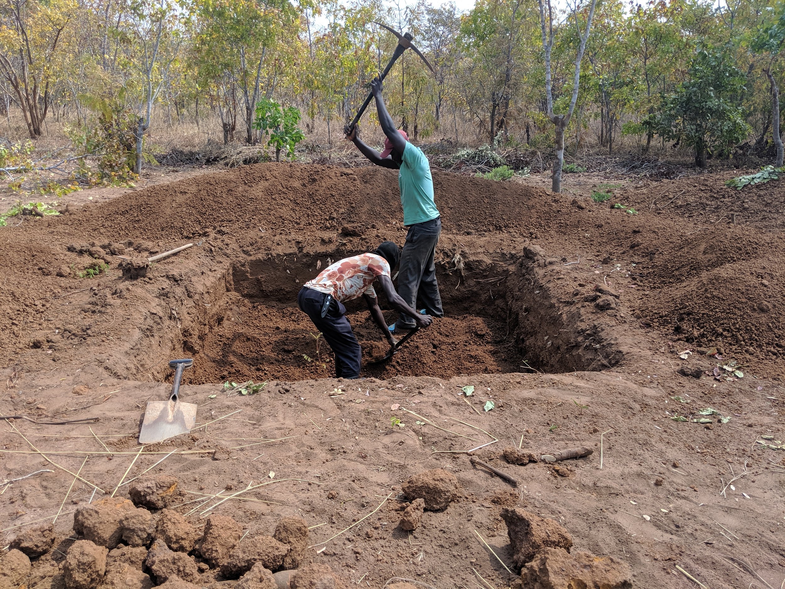 Starting on the third latrine. The second still has another meter to go.