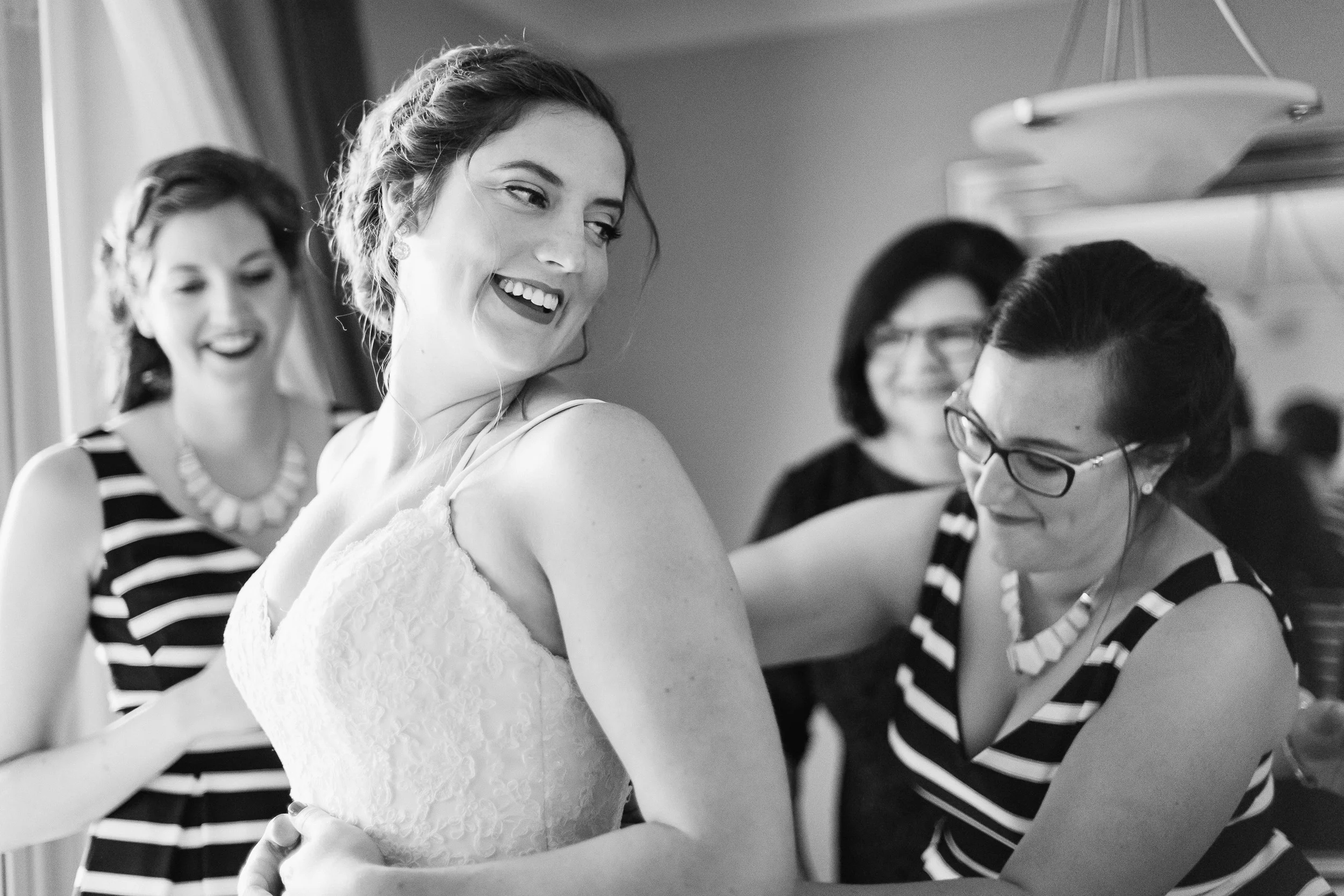 Bride_with_Bridesmaids_Getting_Ready.JPG