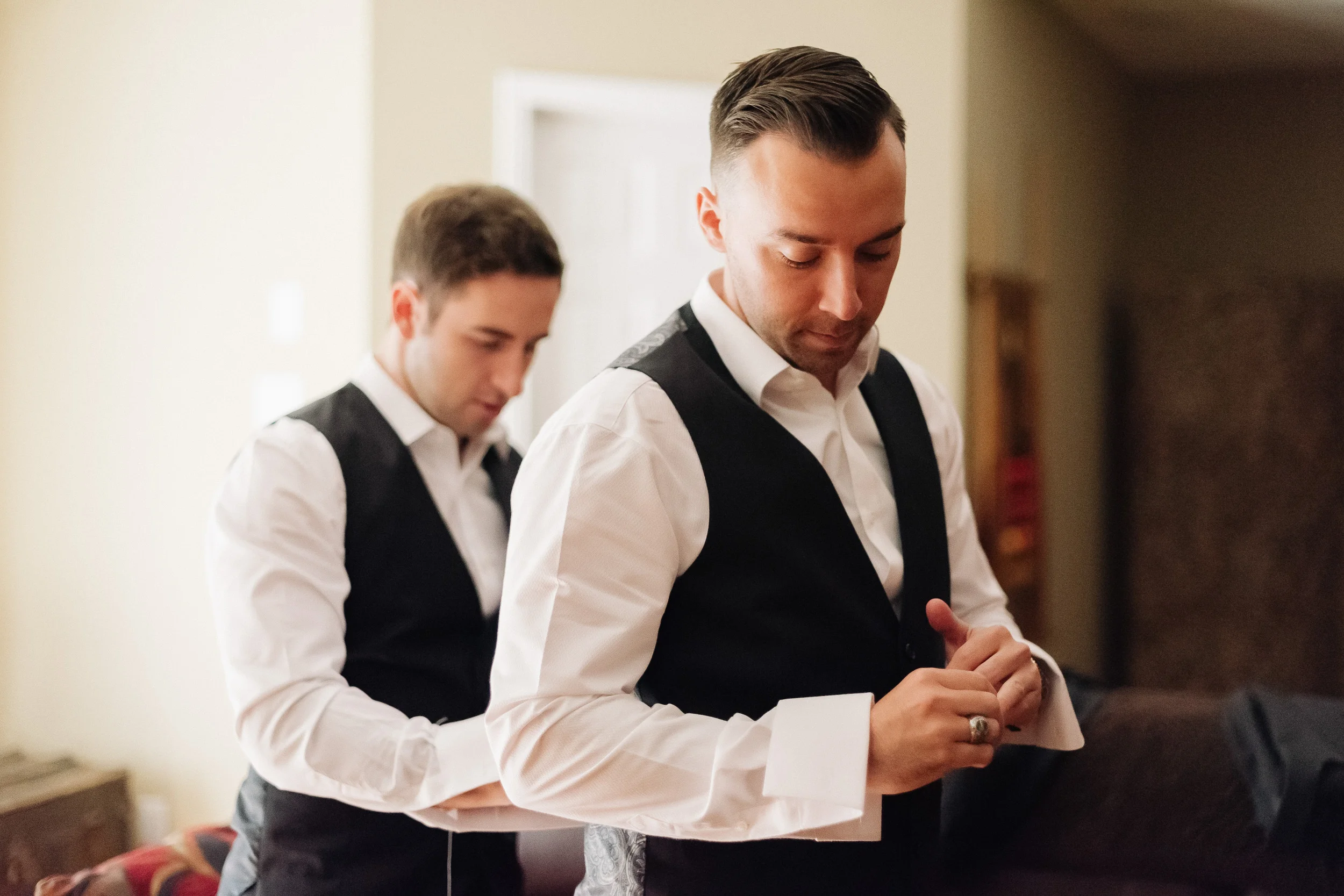 Getting_ready_groomsmen_vests.JPG