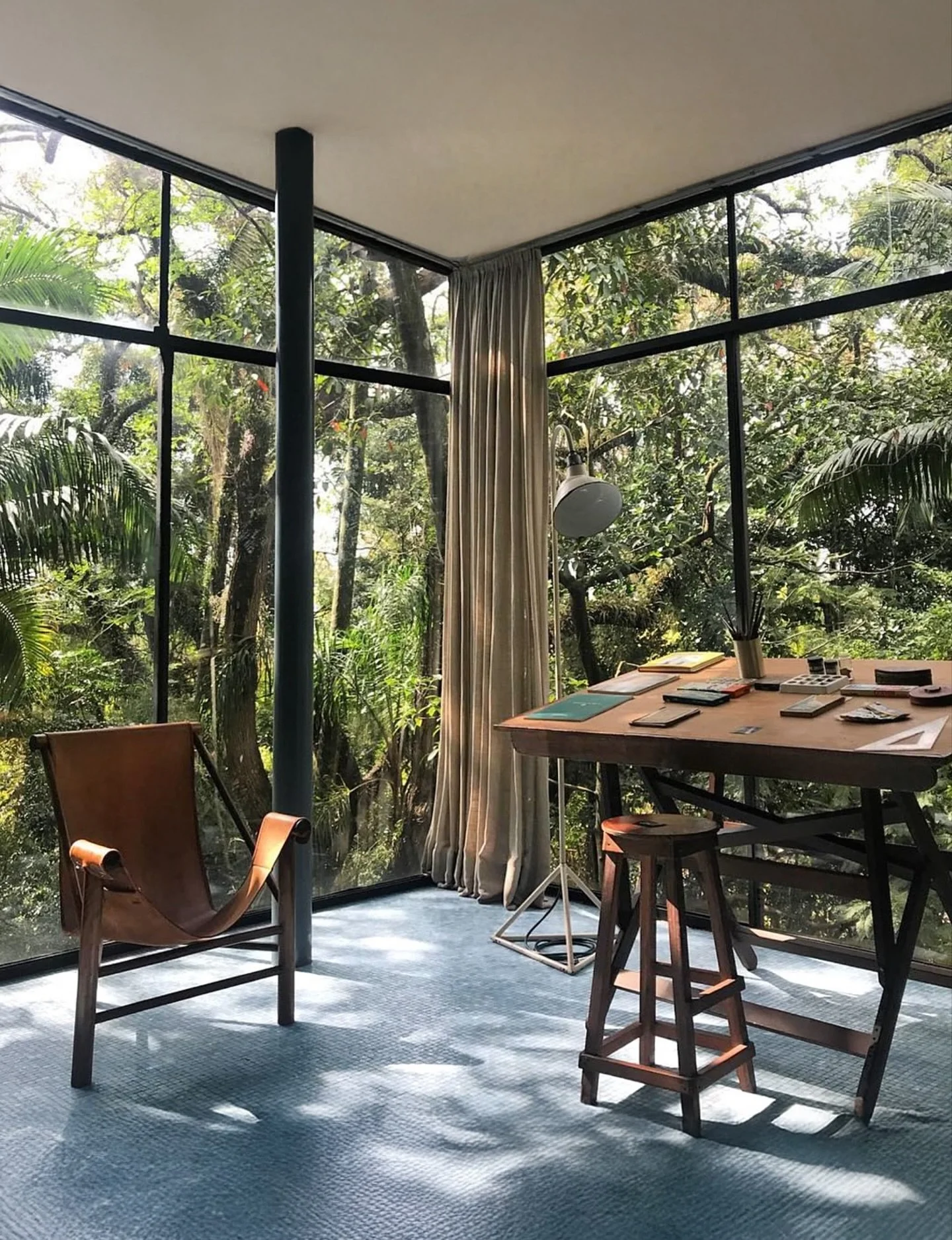 The Casa de Vidro (Glass House), located in S&atilde;o Paulo, Brazil, was designed by architect Lina Bo Bardi as her own residence in 1951. Bo Bardi graduated in architecture from the Sapienza University of Rome in 1939 and, after World War II, moved