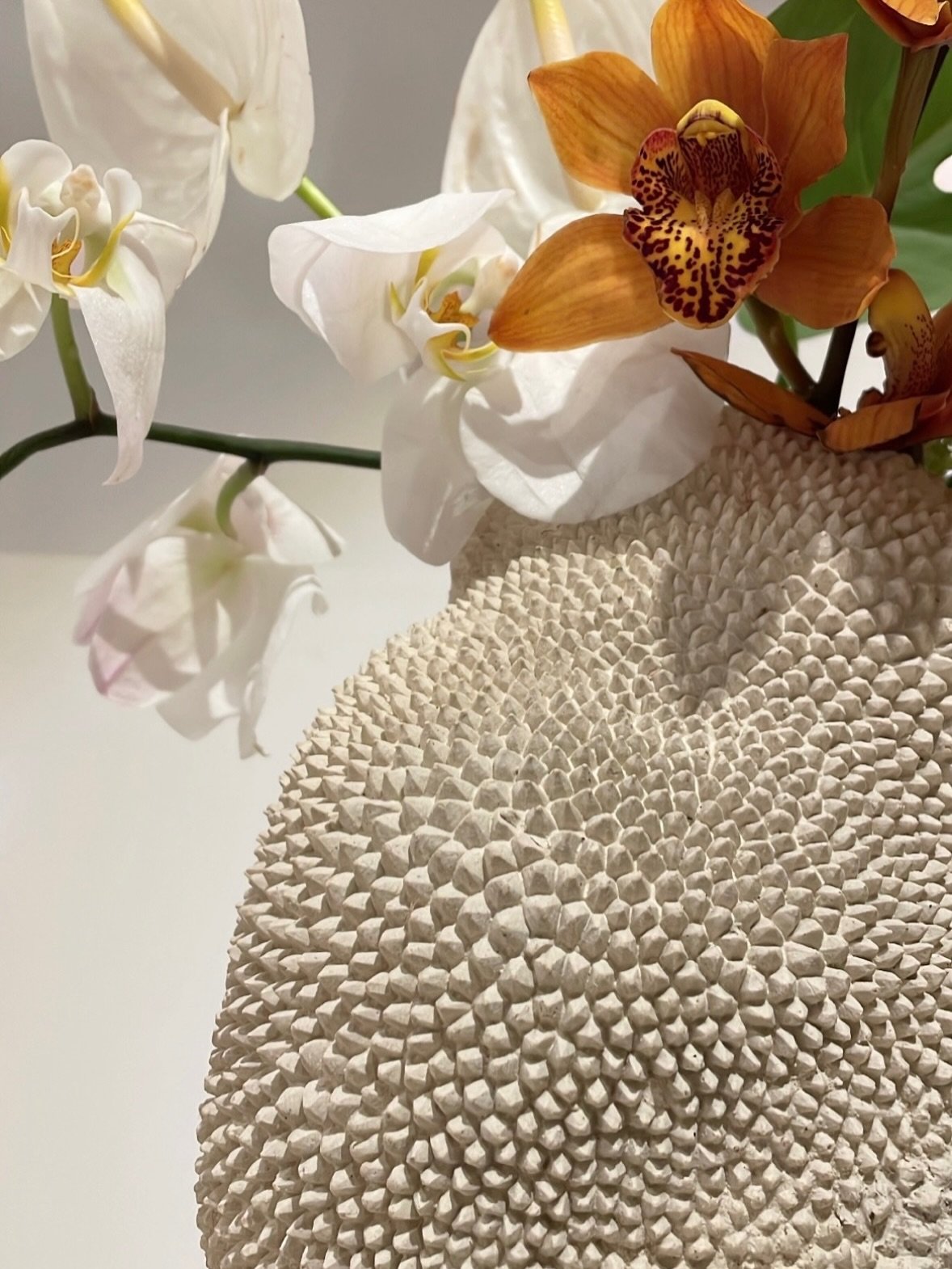 Our JACA vases and lamps borrow their distinctive texture from the jackfruit. Shaped by hand in clay, each piece brings together design, craft and Brazilian nature. After all these years, I still love making them - their shapes and textures never sto