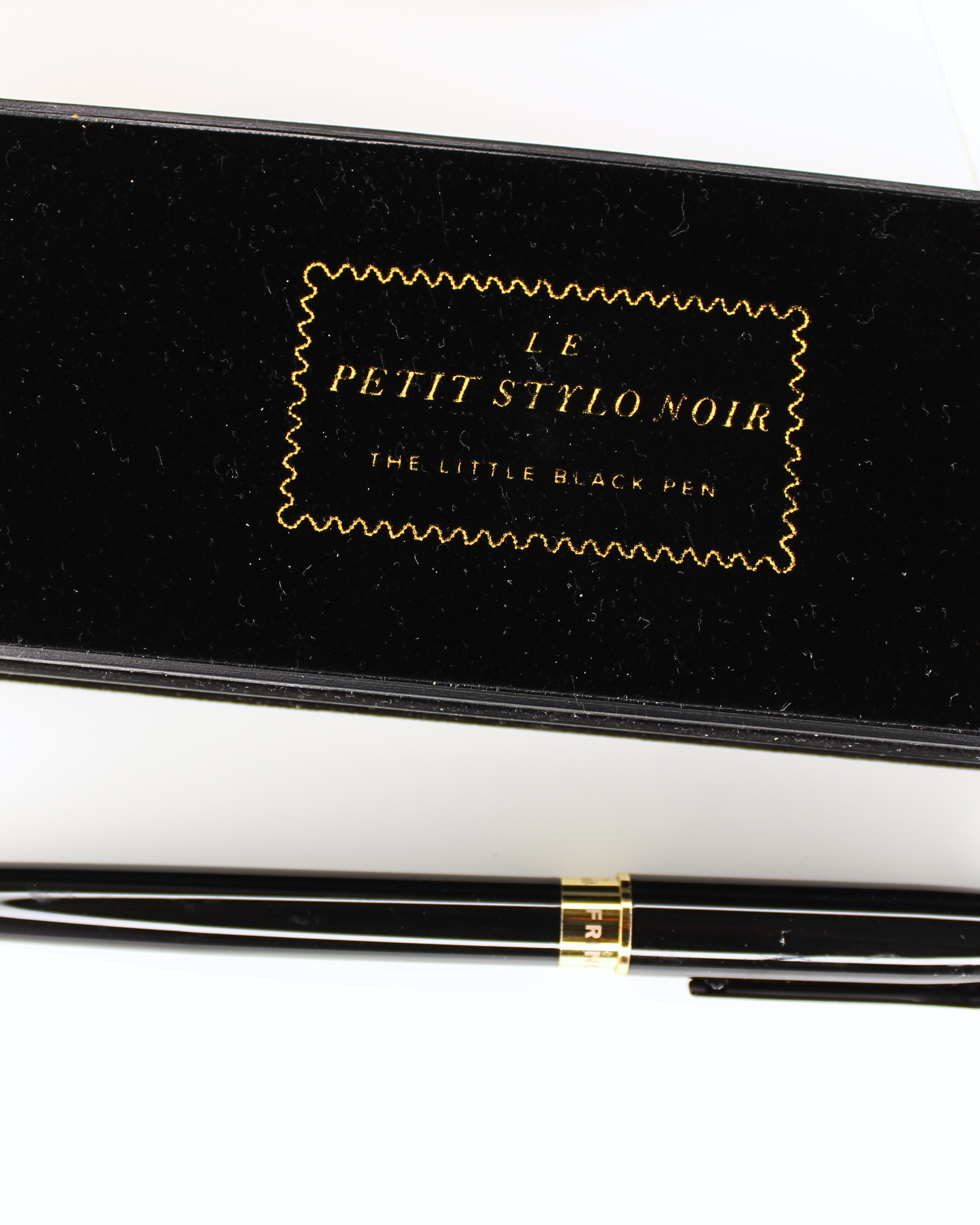 Beautiful little black pen written in French for The Postcard Société, postcard correspondence subscription box curated by social and cultural psychologist and travel psychologist Dr. Katie Blake, PhD.