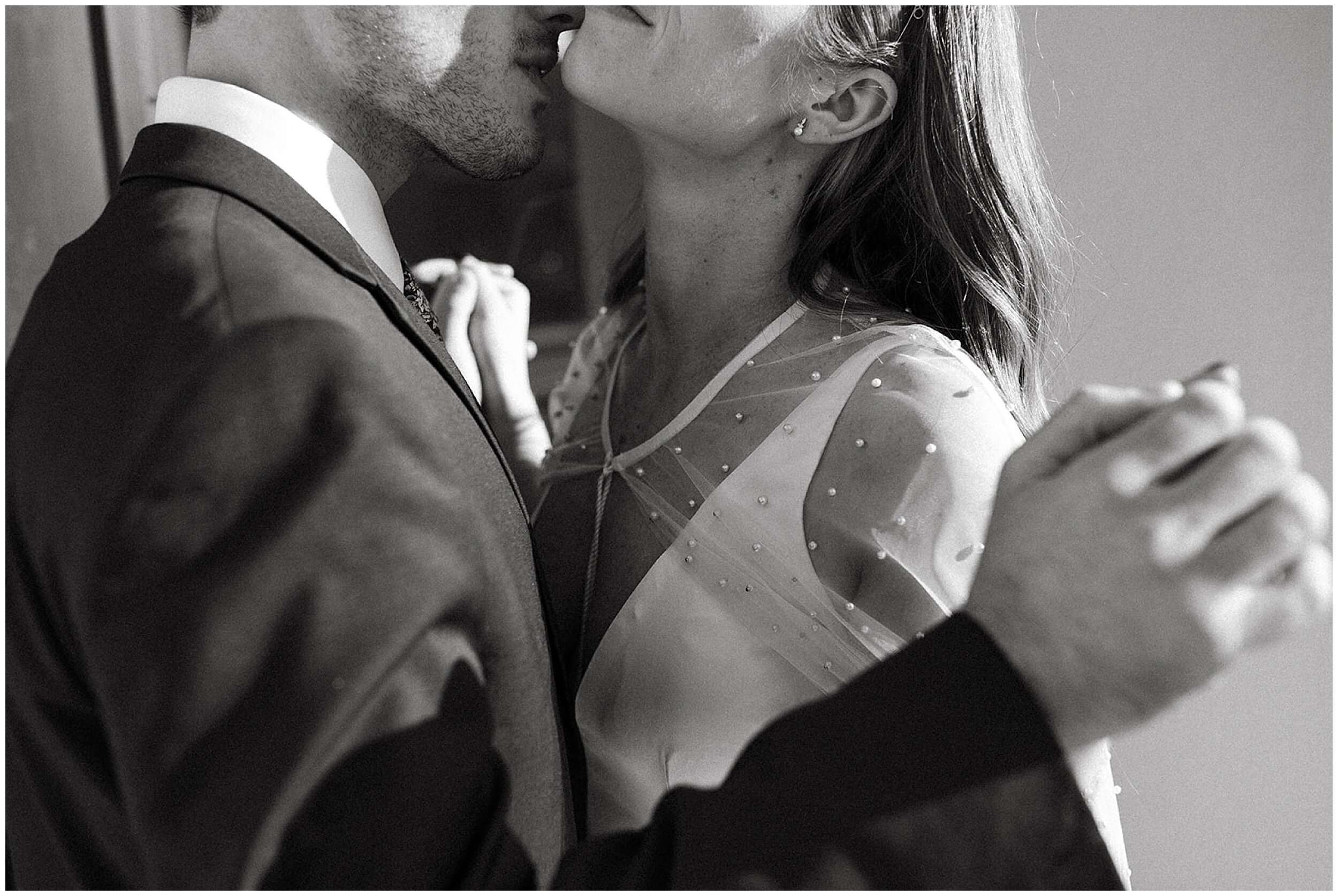 bride and groom almost kissing