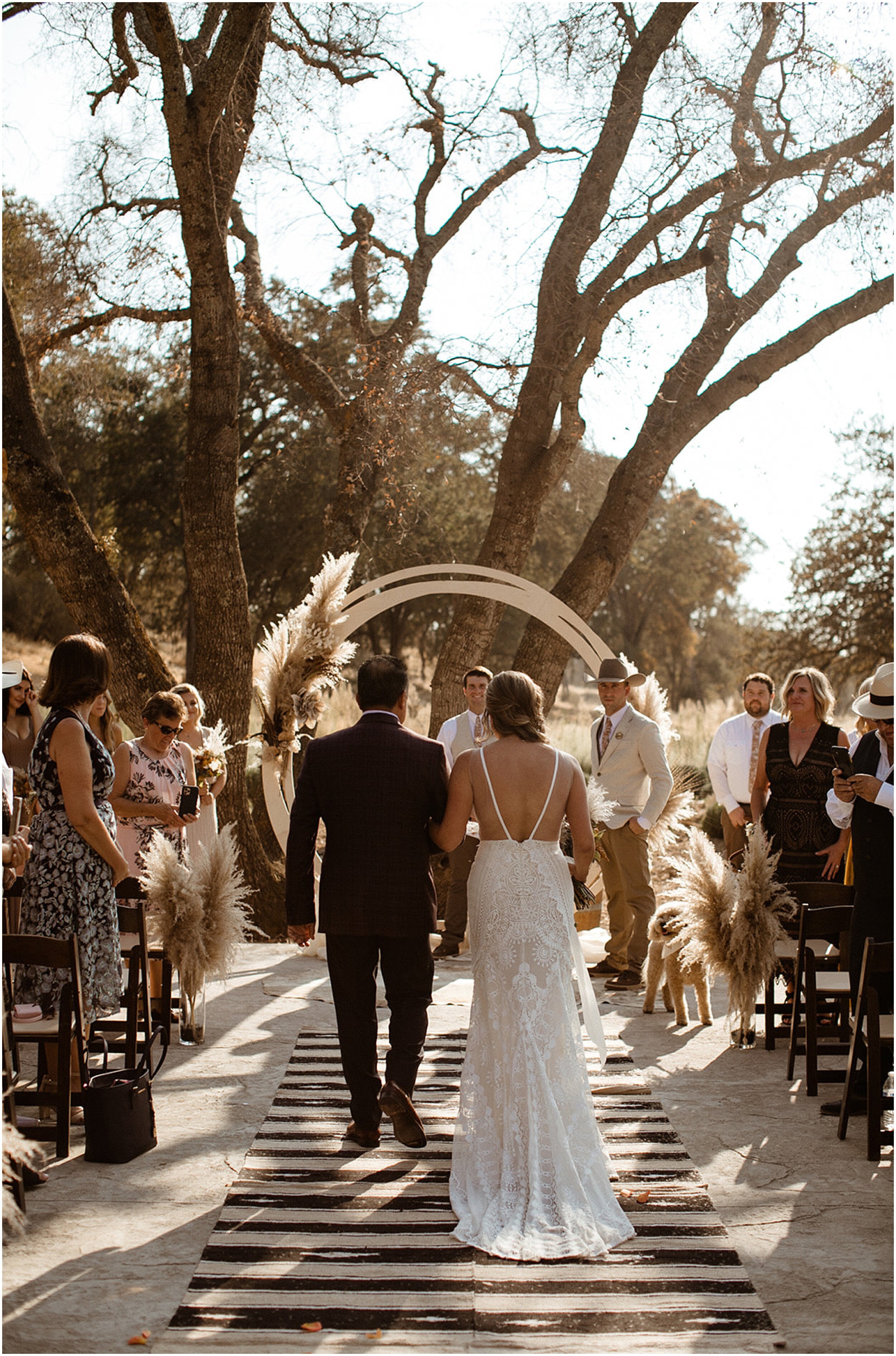 father walking bride down the aisle