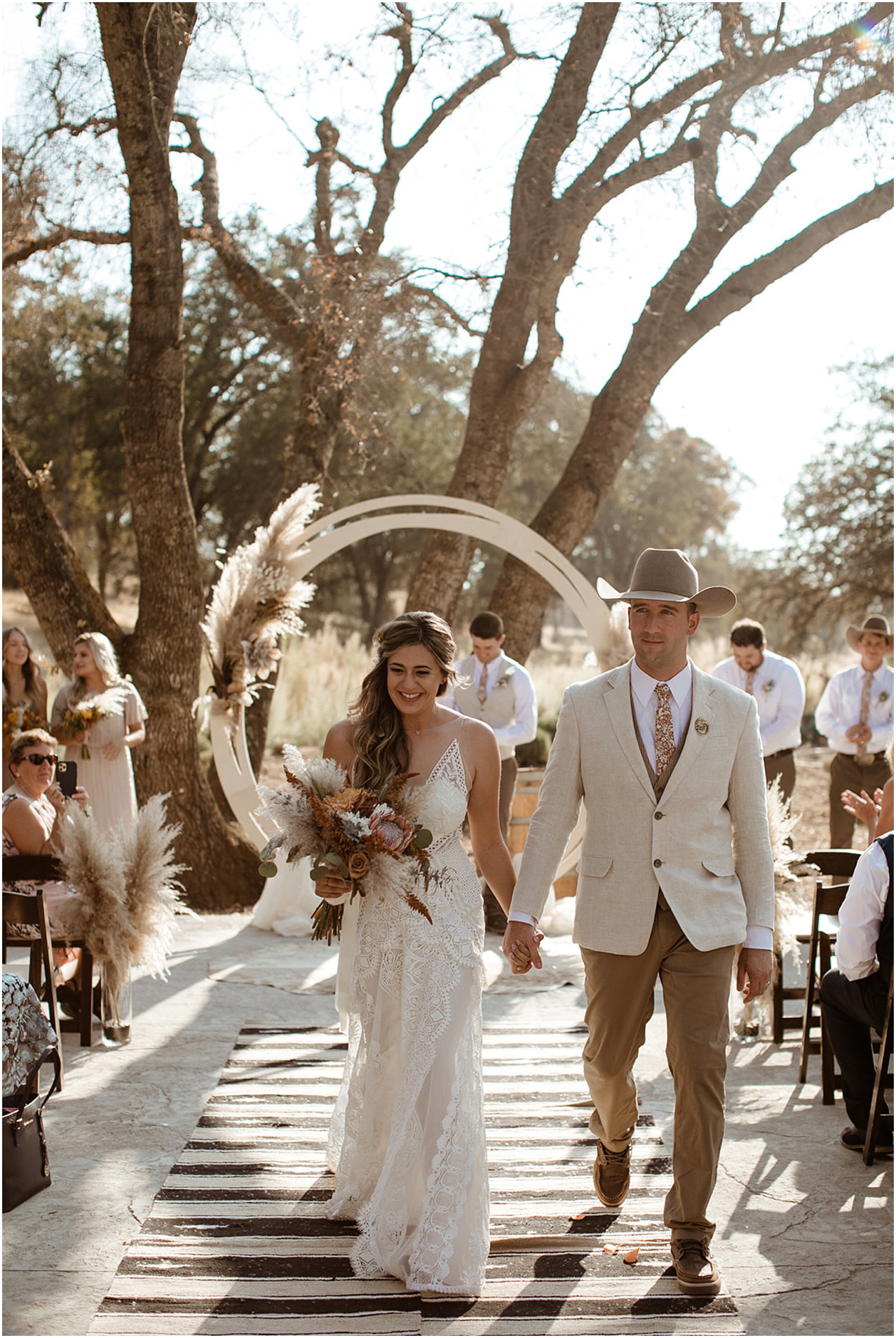 bride and groom walking down the aisle