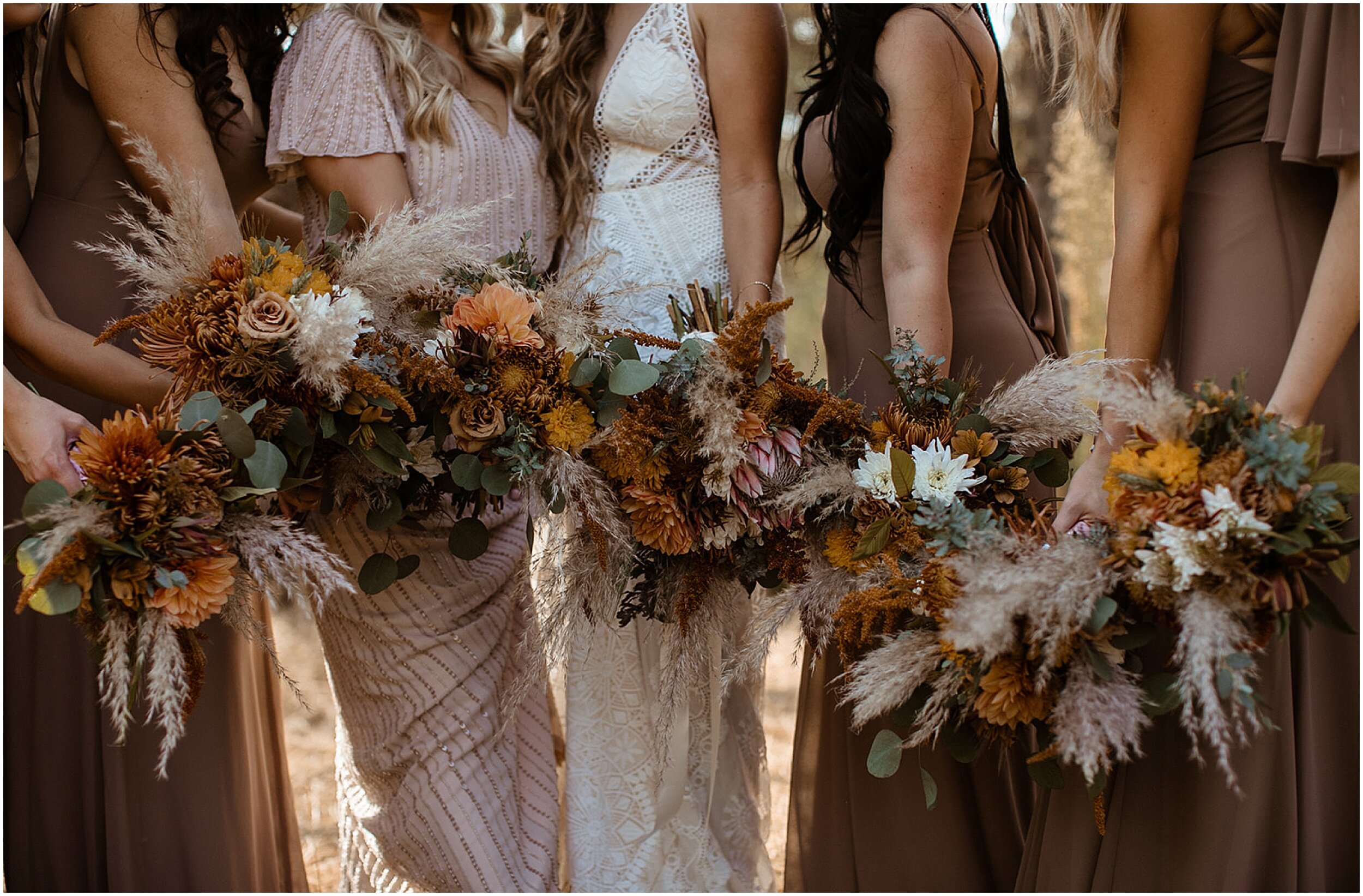 bridal party holding bouquets