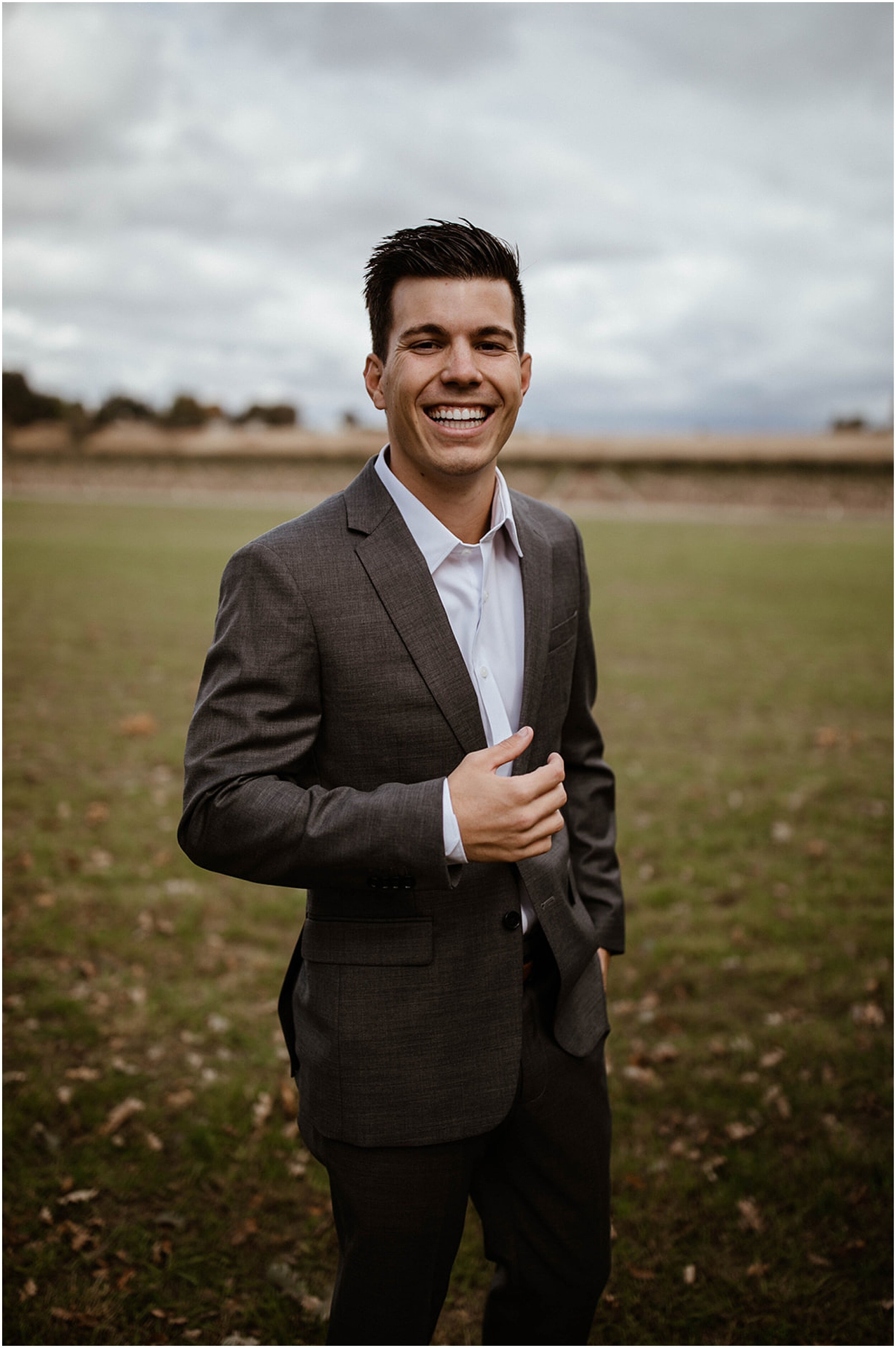 groom smiling at camera