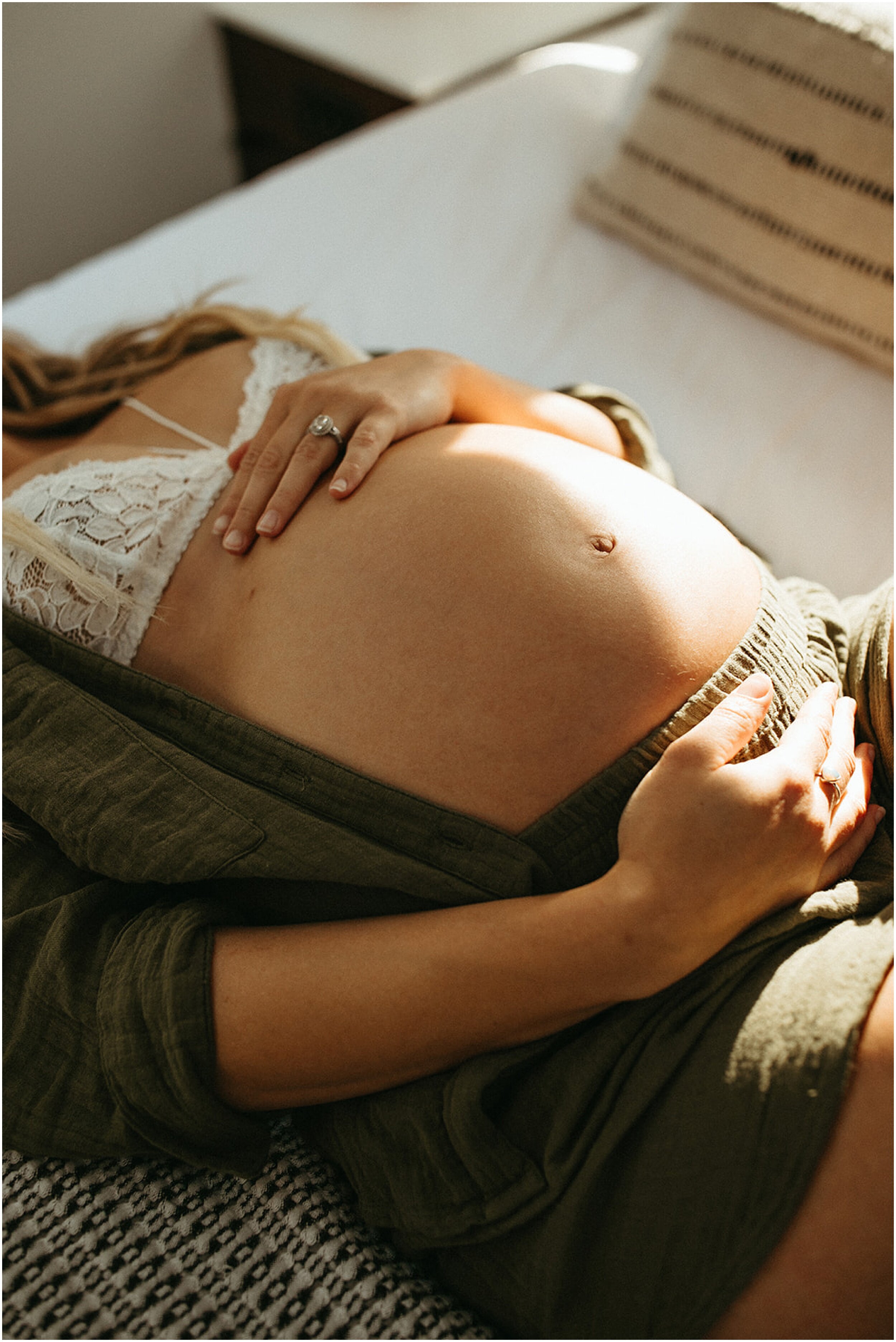 pregnant woman holding belly