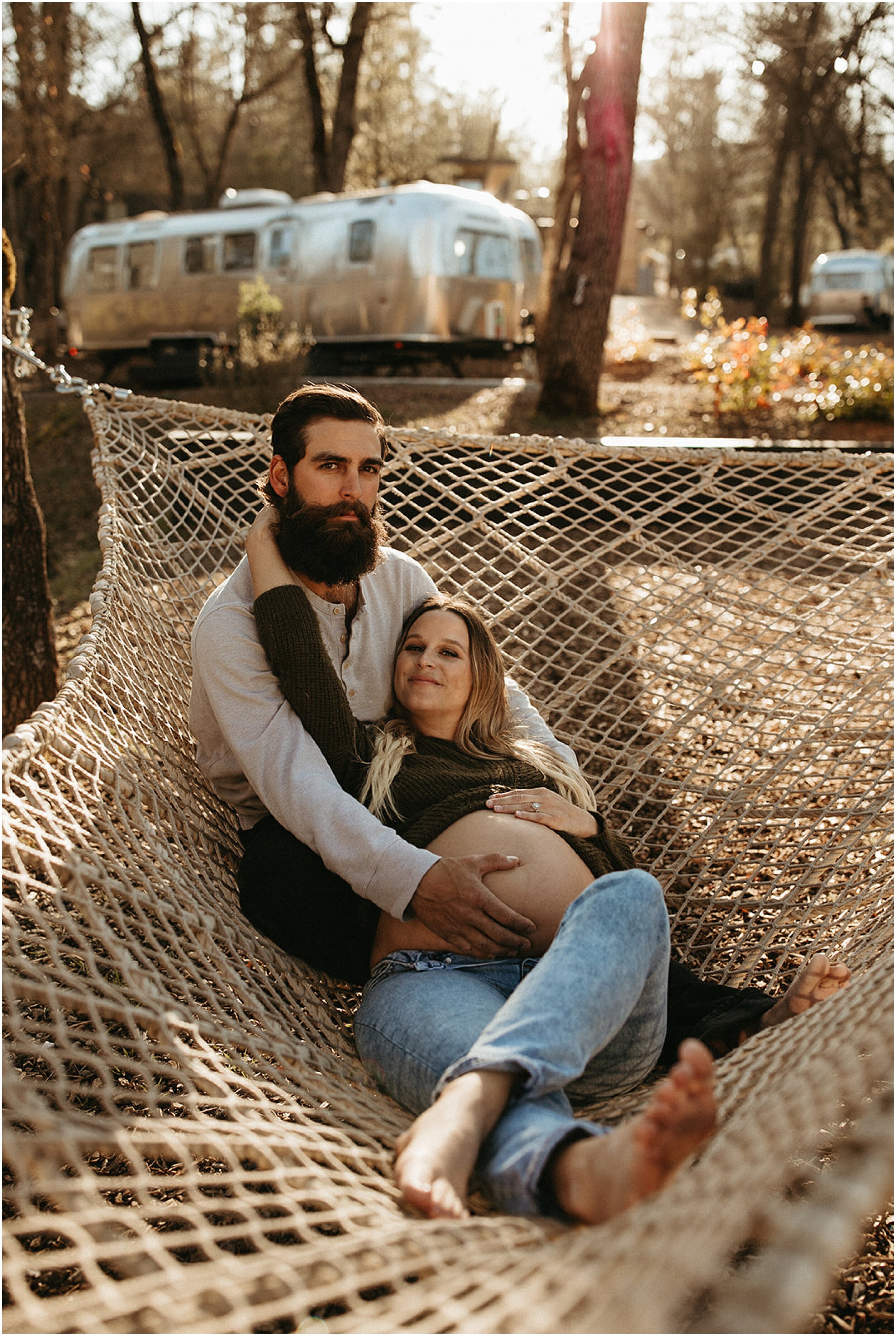couple sitting in hammock