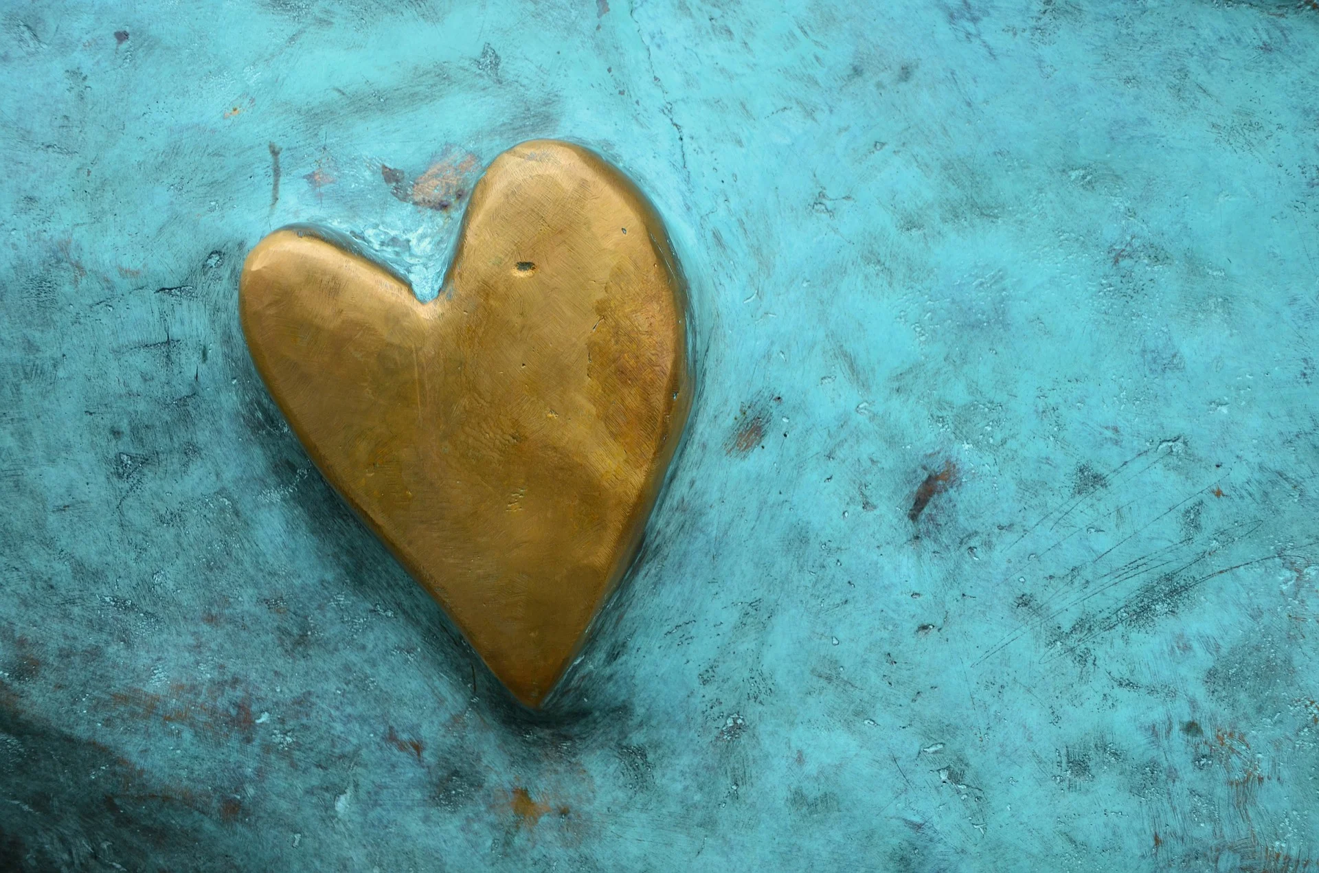 gold.heart.on.turquoise.pixabay.jpeg