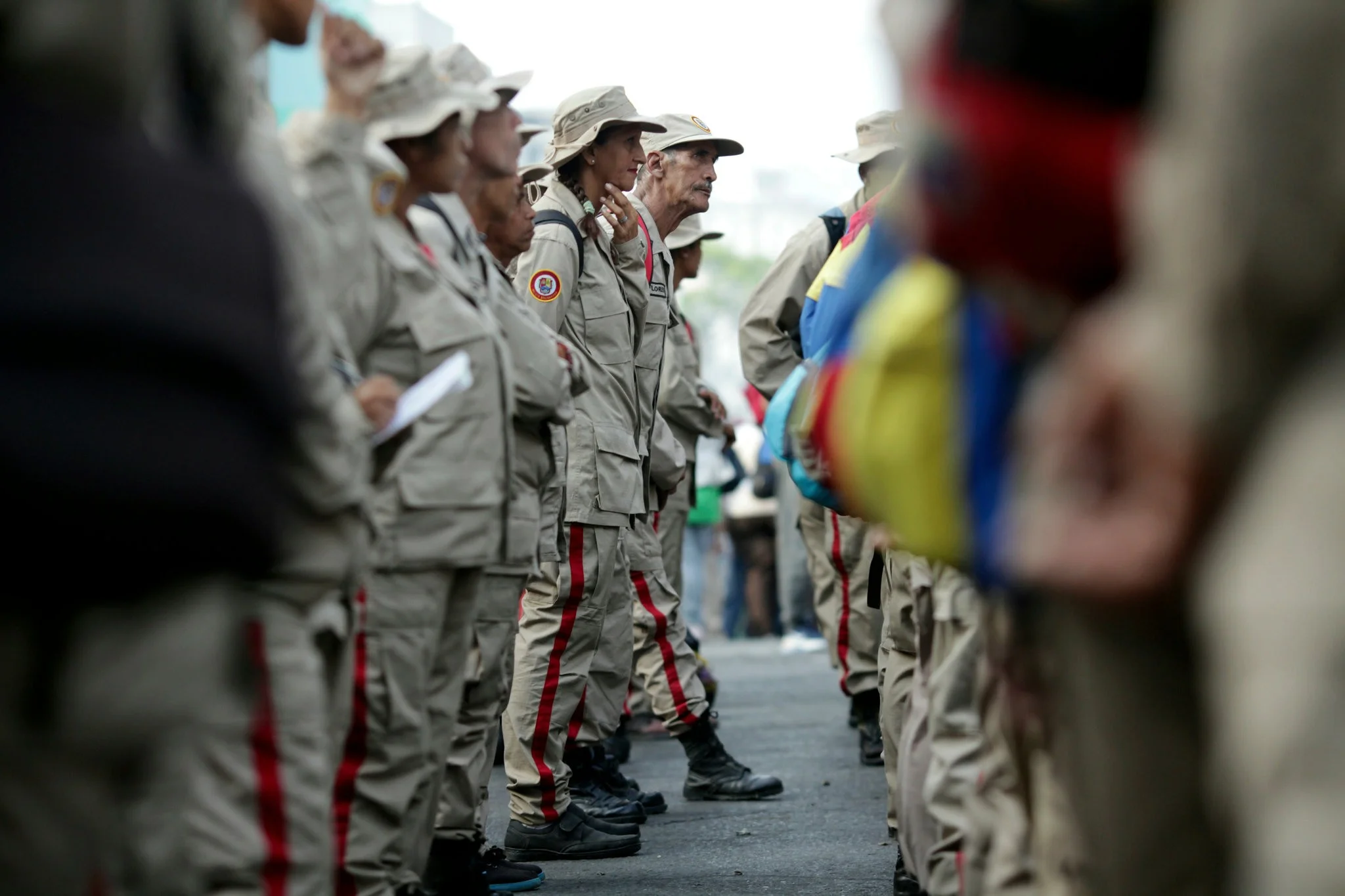 Pro-Maduro forces gathering outside the presidential palace to show their support on Wednesday. Credit Boris Vergara/Associated Press