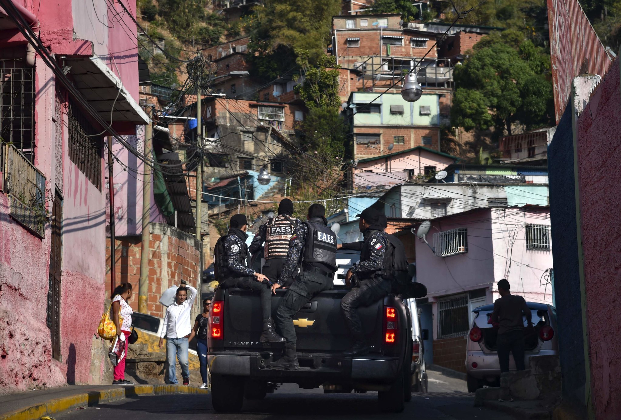 Venezuela’s Special Action Forces carrying out a security operation in Caracas in April. Credit Yuri Cortez/Agence France-Presse — Getty Images