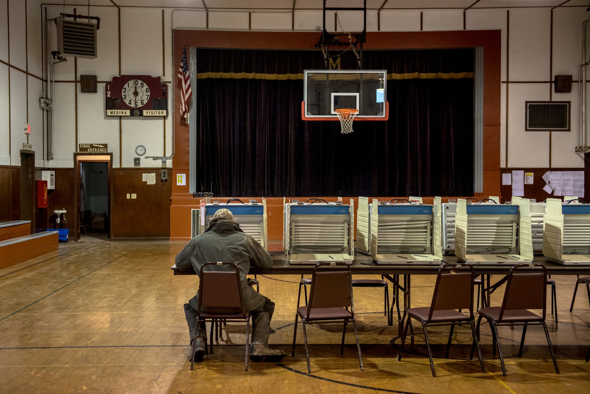 A voter casting his ballot in the midterm elections last year in Medina, N.D. Credit Hilary Swift for The New York Times