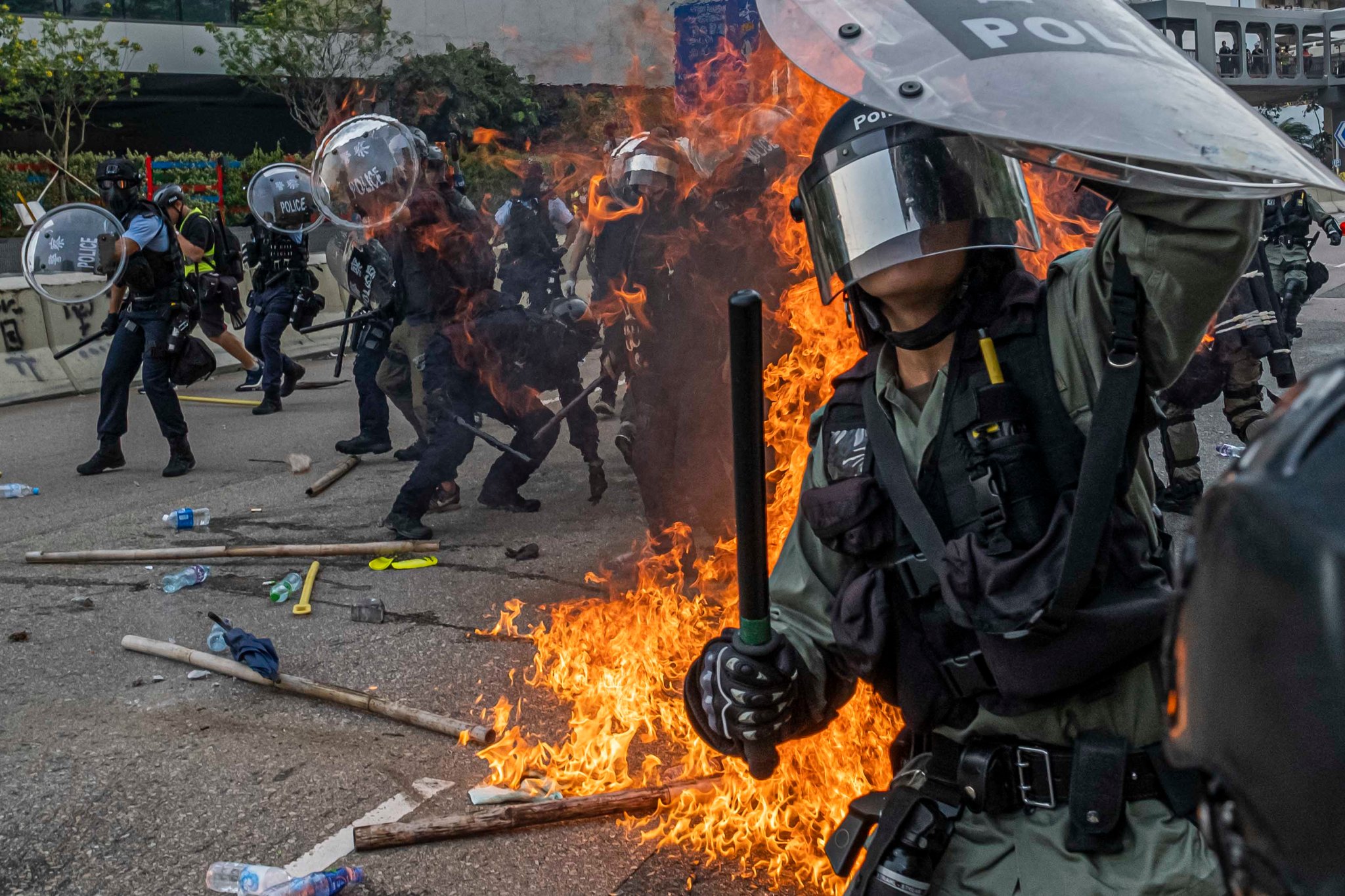The police in Hong Kong said that protesters had started fires and hurled bricks at officers on Saturday. The authorities said that the use of force had been required to disperse the crowd. Credit Lam Yik Fei for The New York Times