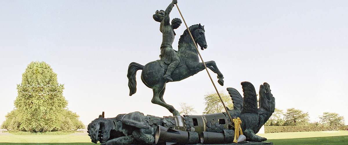 Sculpture depicting St. George slaying the dragon. The dragon is created from fragments of Soviet SS-20 and United States Pershing nuclear missiles. UN Photo/Milton Grant