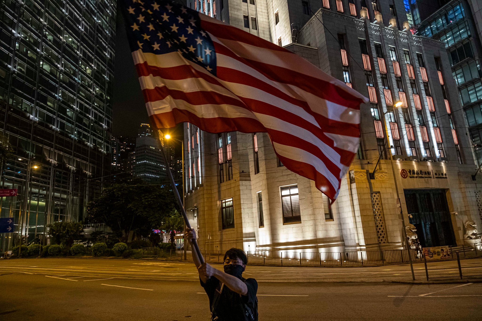 A protester in Hong Kong last month. China sees American support for democratic rights in Hong Kong as part of a plot to undermine the Communist Party. Credit Lam Yik Fei for The New York Times