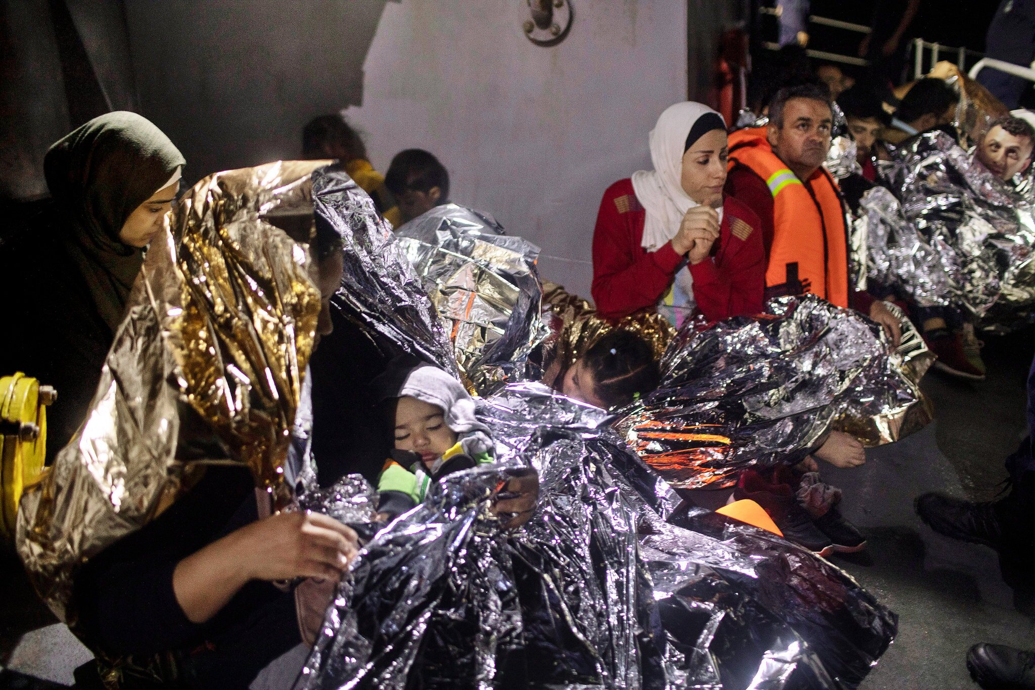 Refugees were rescued Thursday by a Greek Coast Guard ship near the island of Samos. Credit Petros Giannakouris/Associated Press