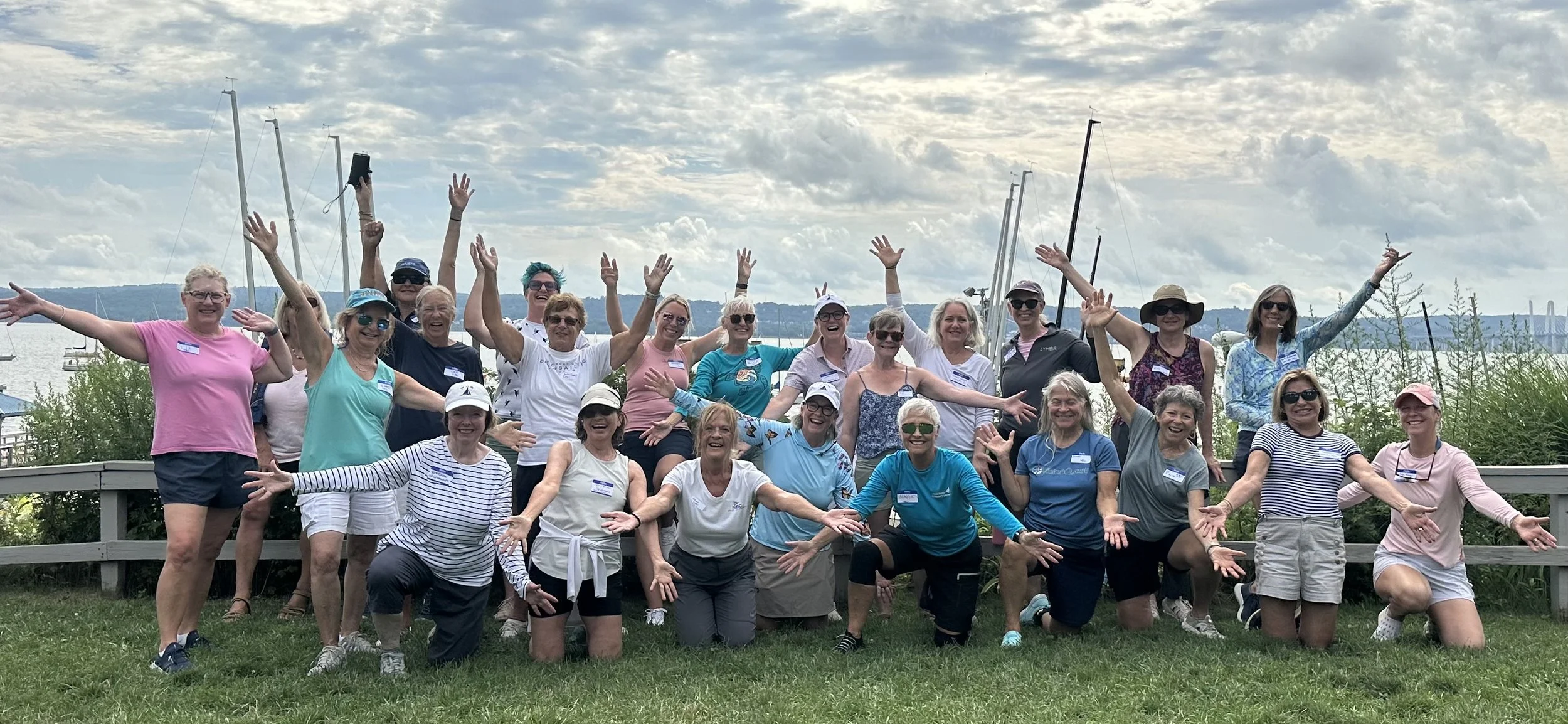 Nyack Boat Club women gather for a group photo on the lawn after the 2026 supper series sailing event