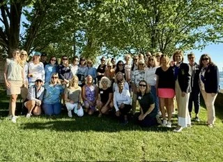 Women on the Water LIS sailors gather on the lawn for the Stamford Yacht Club 2026 Supper Series