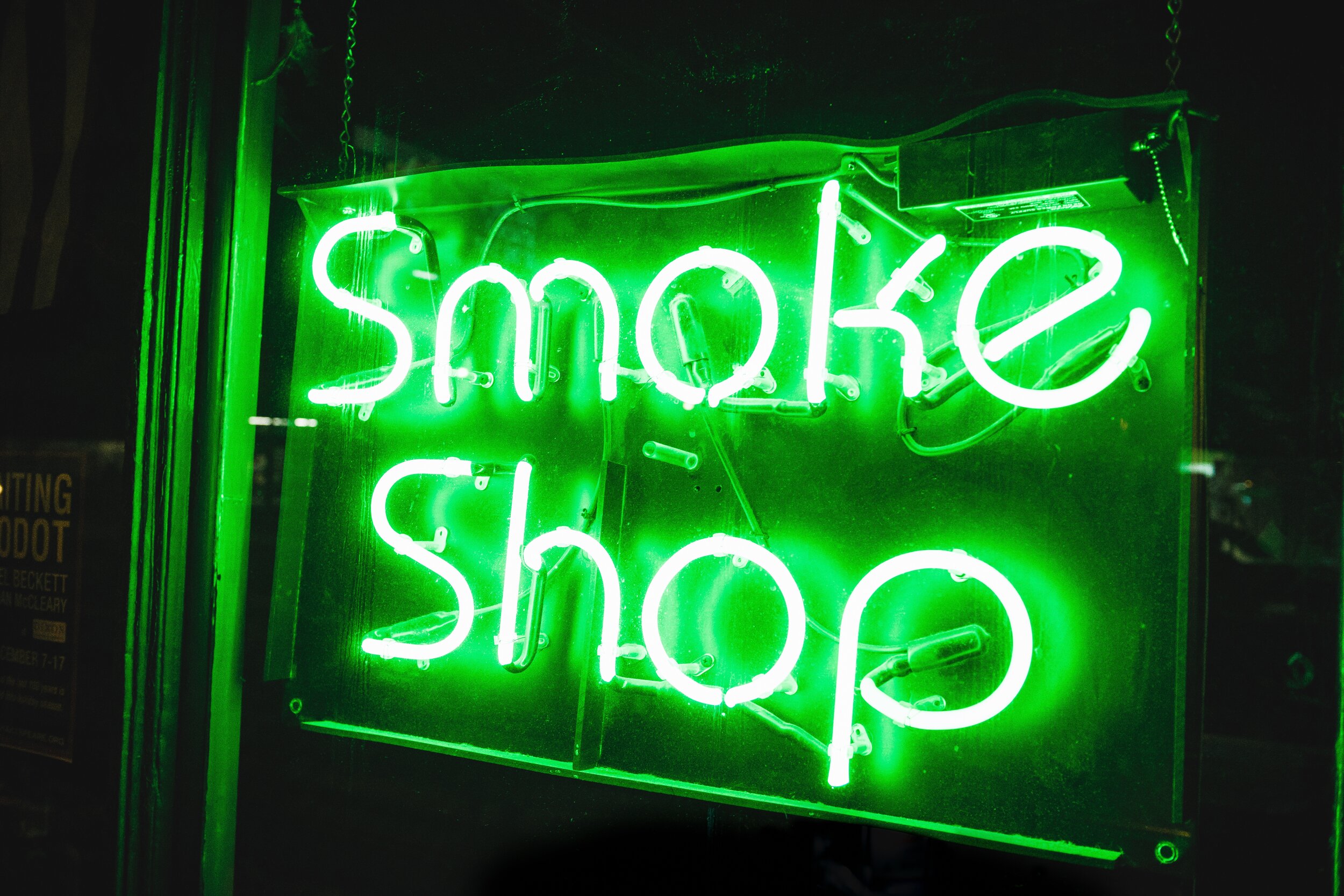 Green unsplashed smoke shop.JPG