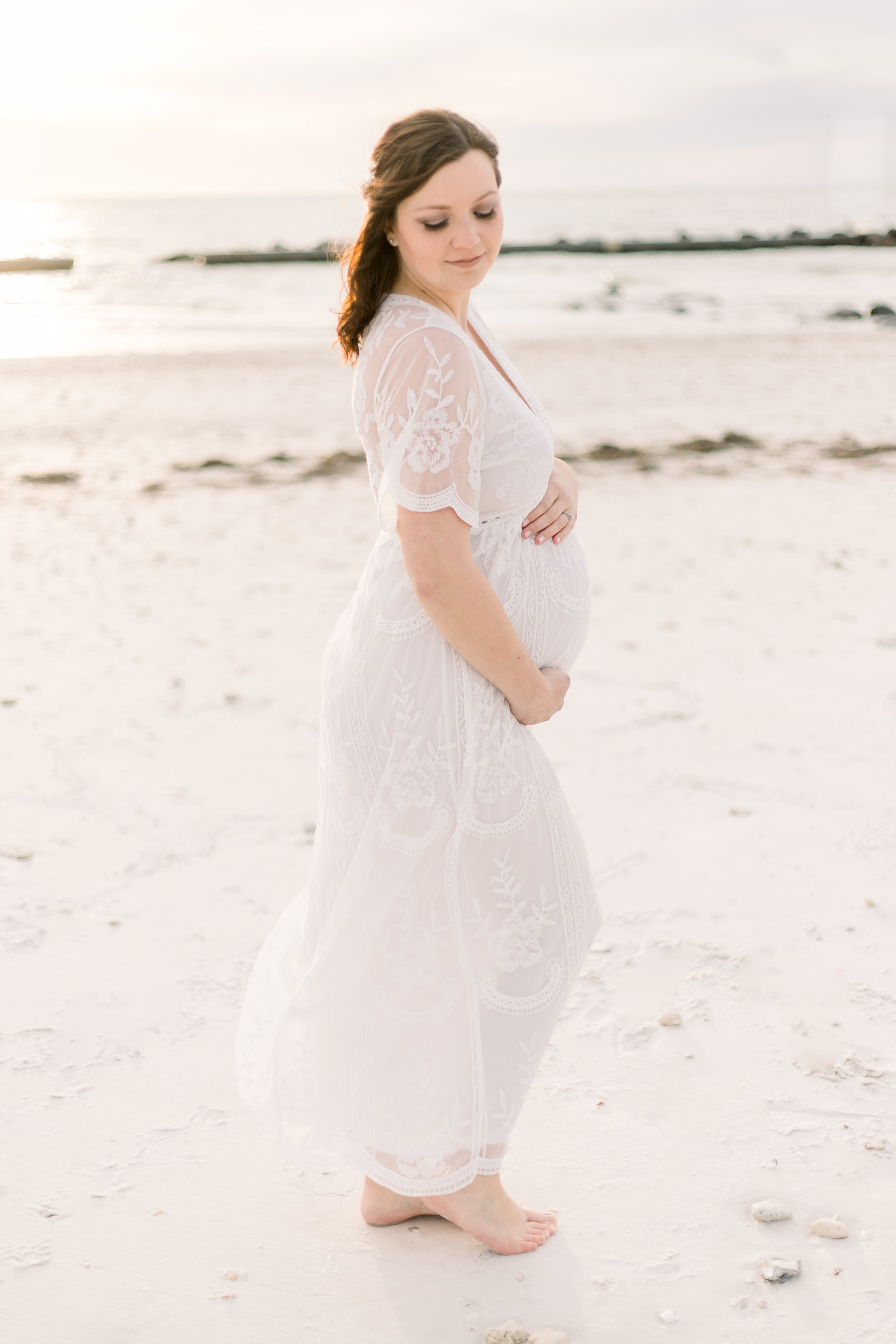 maternity-bride-wearing-pink-blush-white-lace-maternity-gown