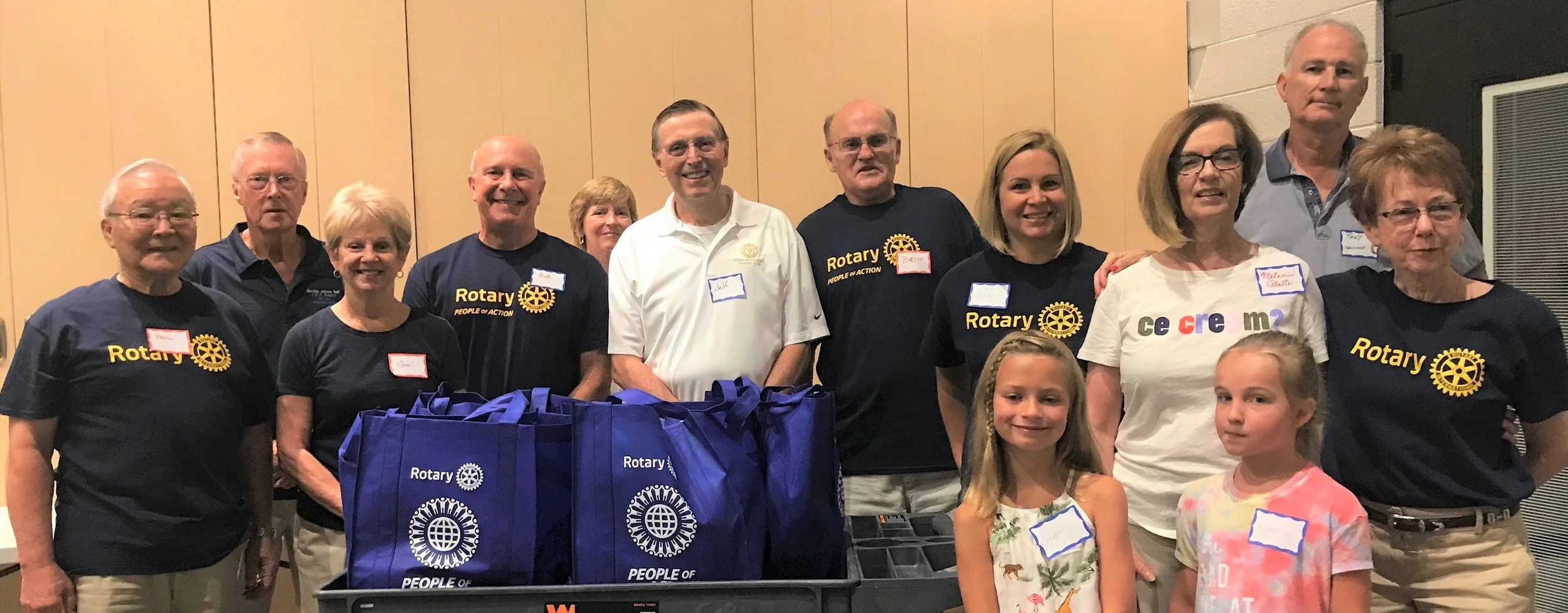 Many Rotarians helped at the Williamsburg House of Mercy food drive in August 2019.