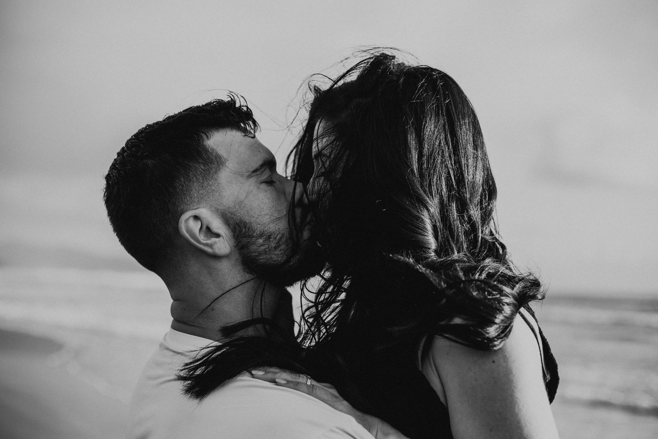 Romantic beach sunset engagement session