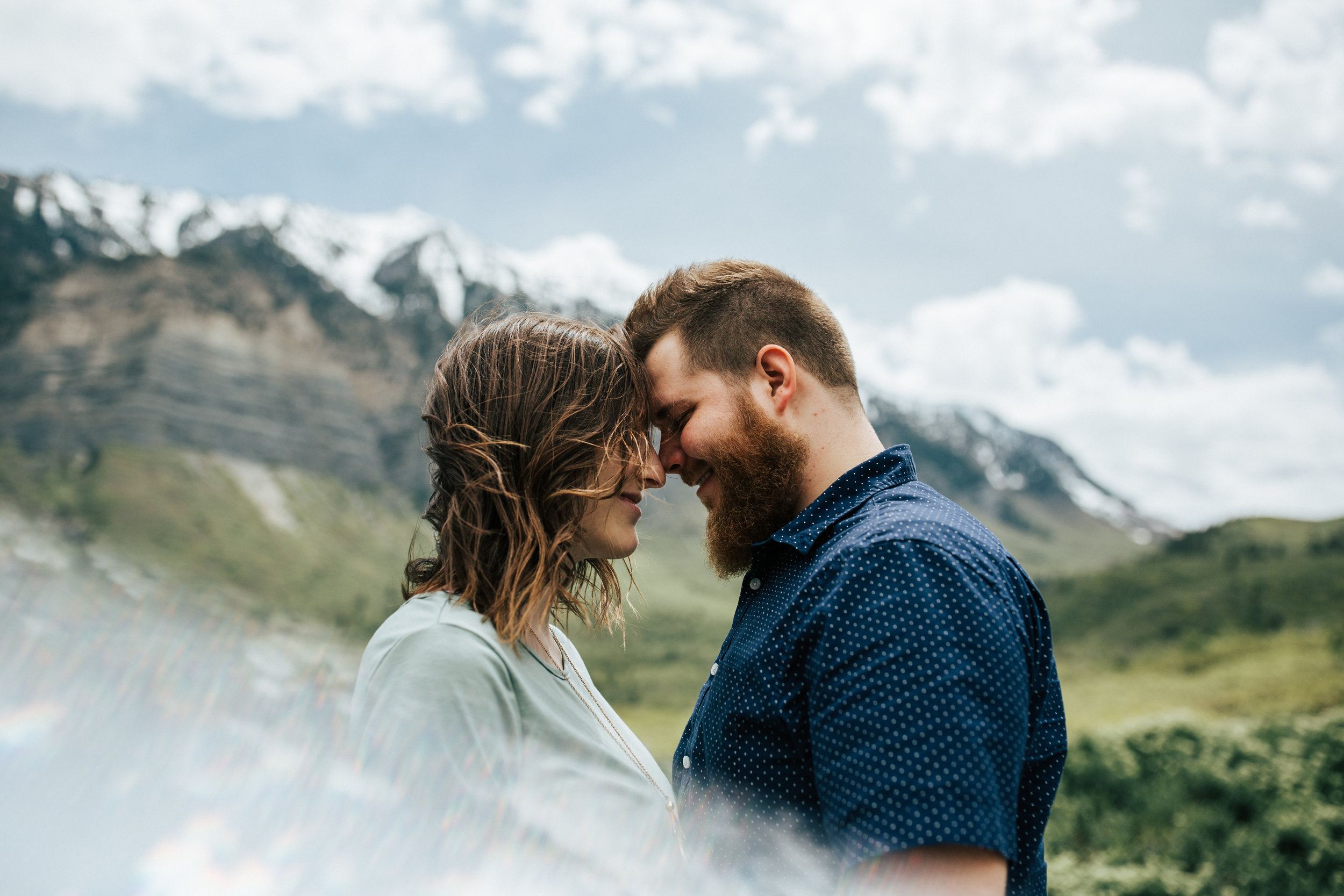 Adventurous mountain couple shoot in Utah windflower field