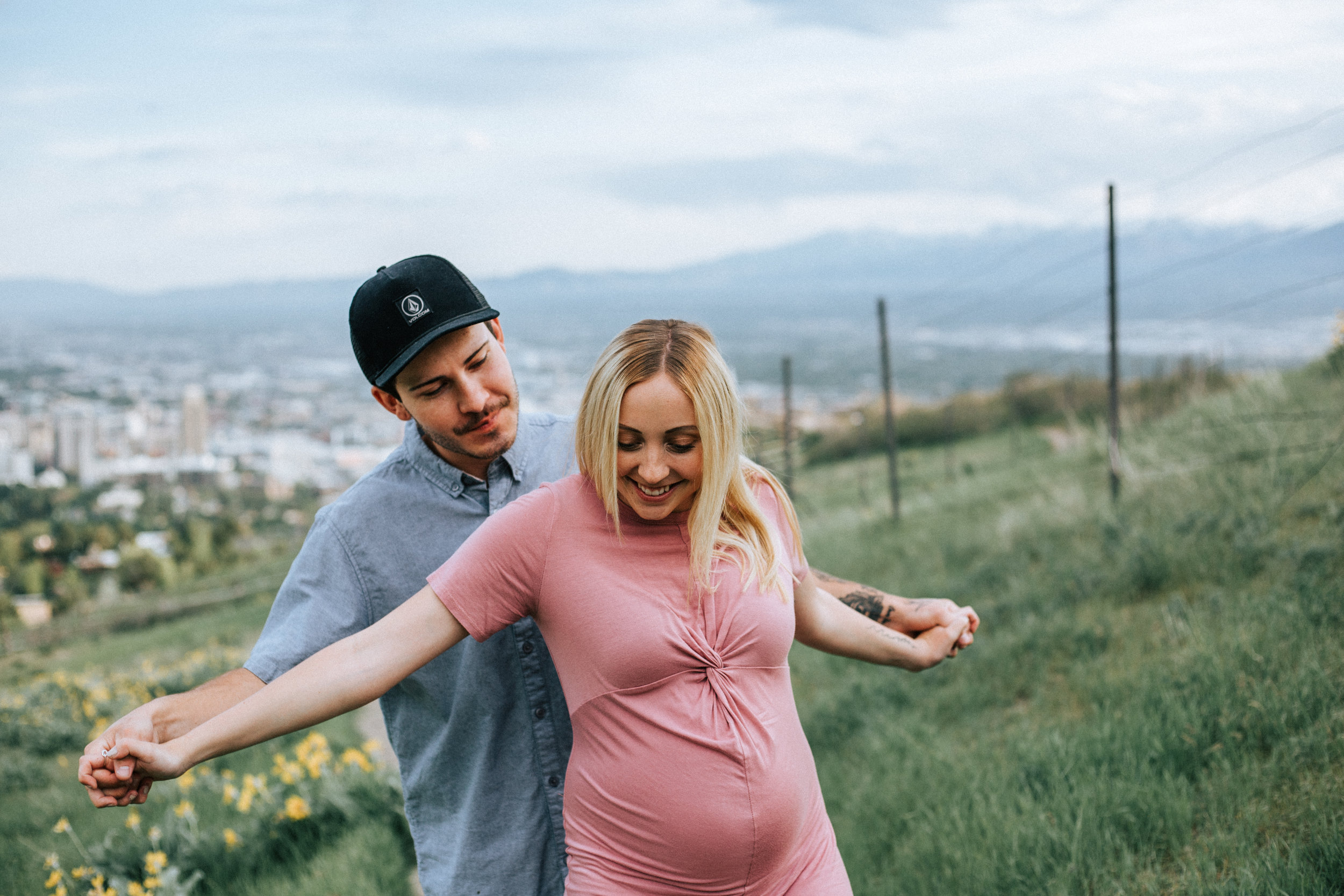 Wildflower couples maternity photos in Utah mountains
