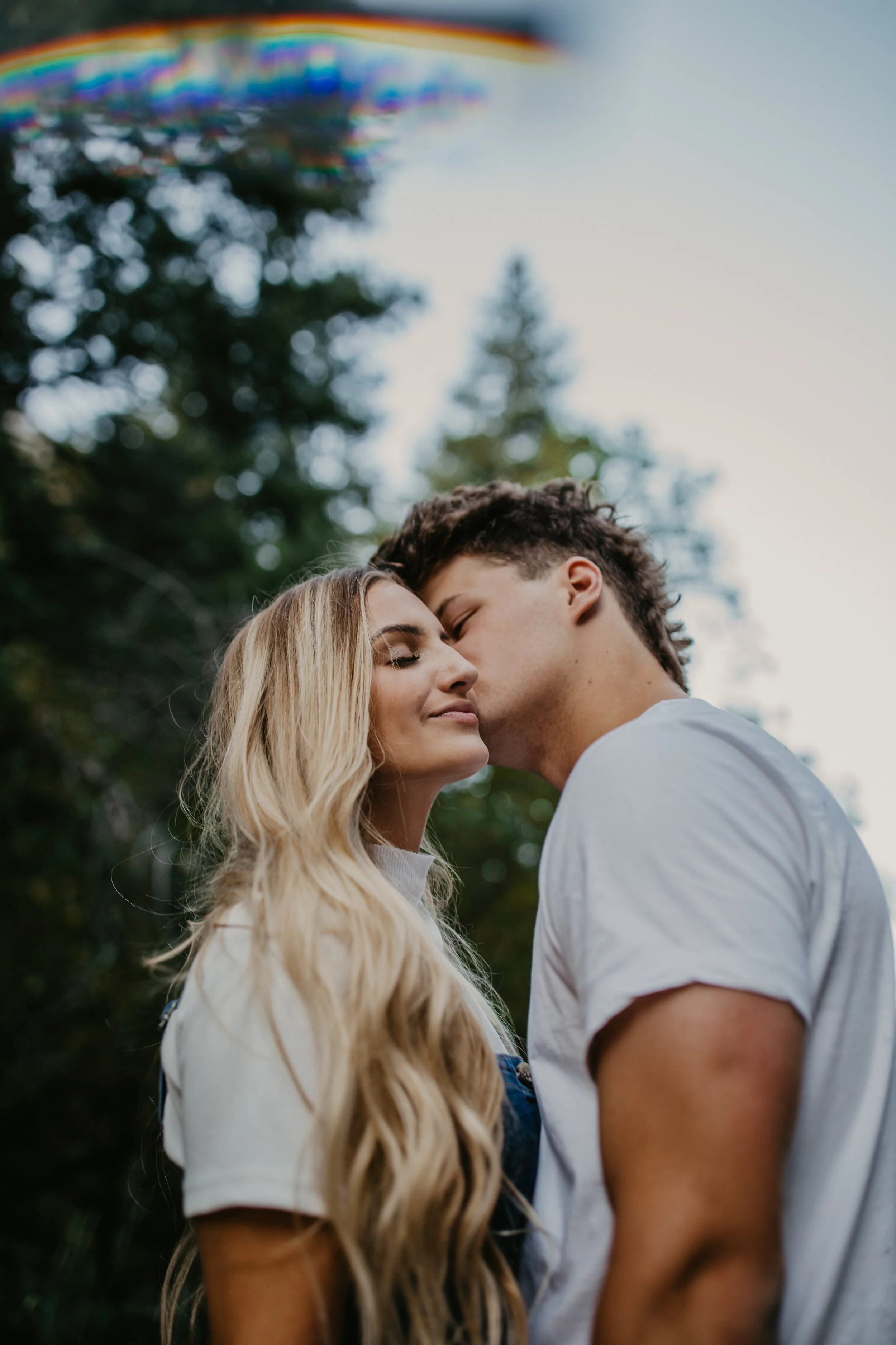 Romantic forest engagement session in Utah mountains long blonde hair