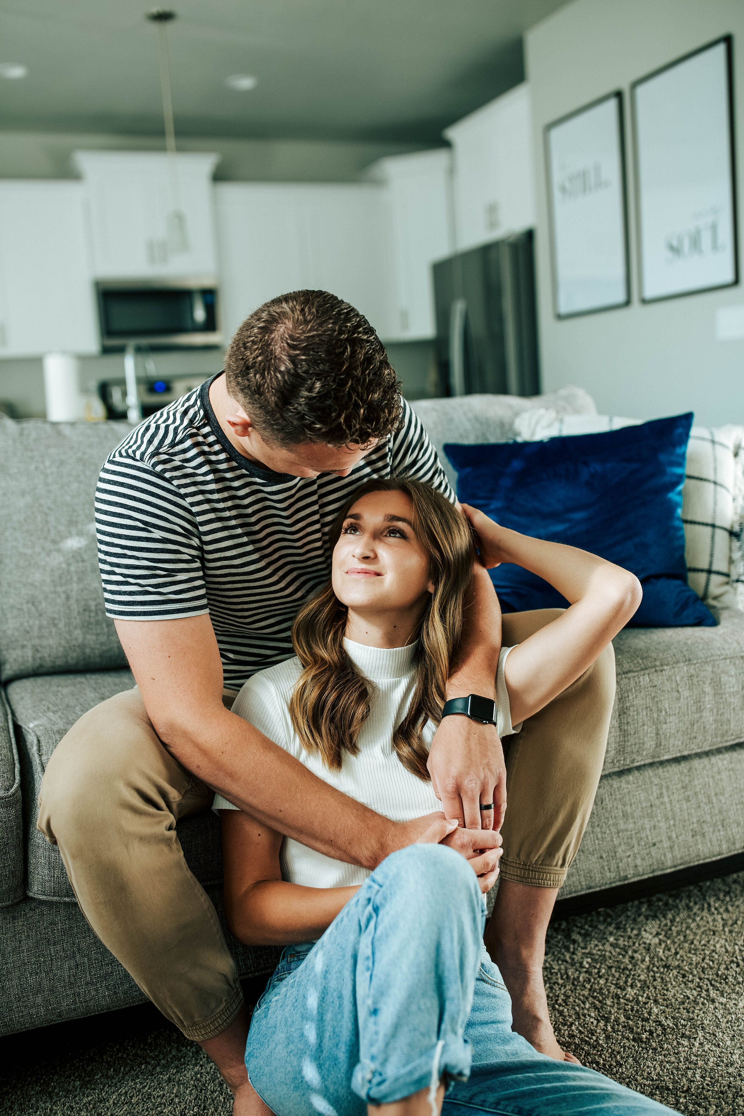 Cozy romantic in home couples shoot sunlight streaking in kitchen photoshoot in love couple #inhomeshoot #coupleshoot #athomeshoot #utahphotographer Utah Oregon cuddling on couch Salt Lake