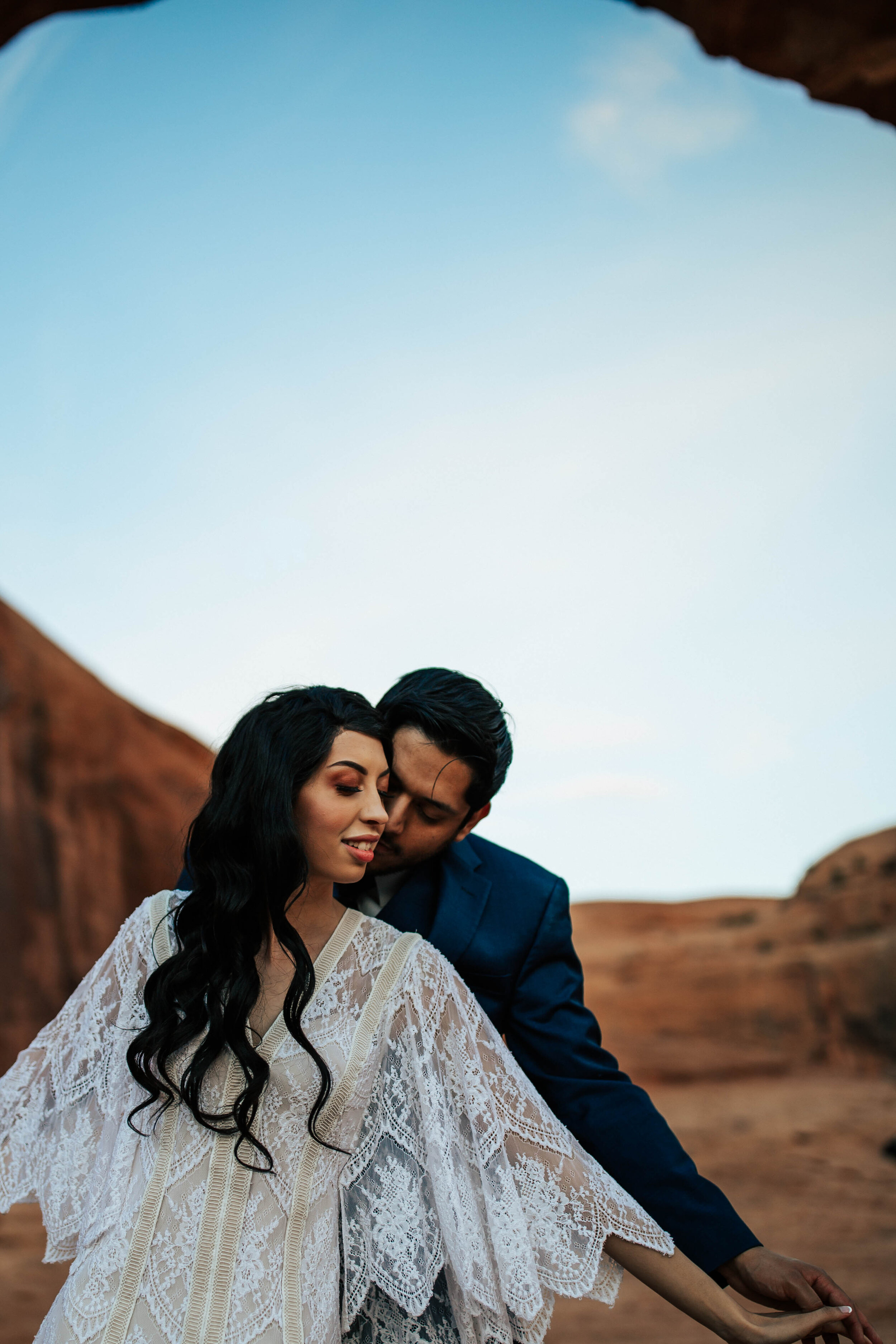 Moab Utah elopement bridal shoot bride and groom Arches national park boho wedding dress #moabphotographer #moabelopement #elopementphotographer #weddingphotographer