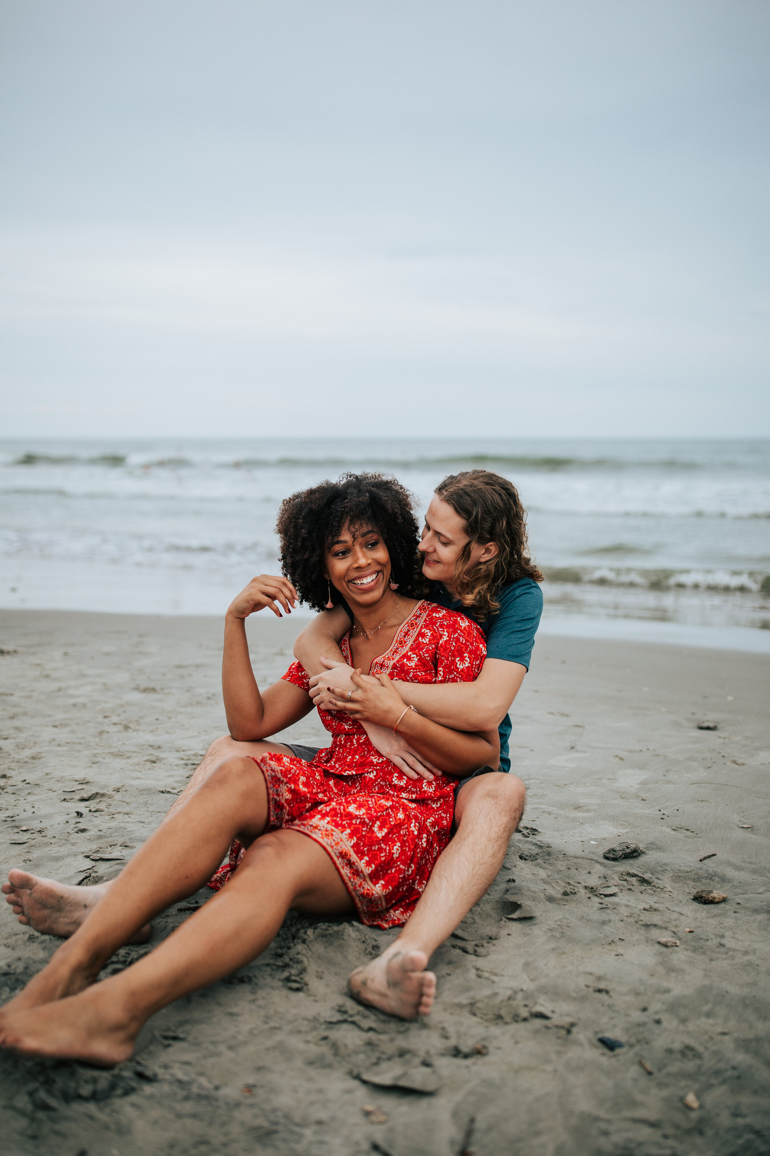 Oregon coast couples shoot engagement session Oregon engagement photographer Oregon wedding photographer elopement photographer couples shoot on the beach in water