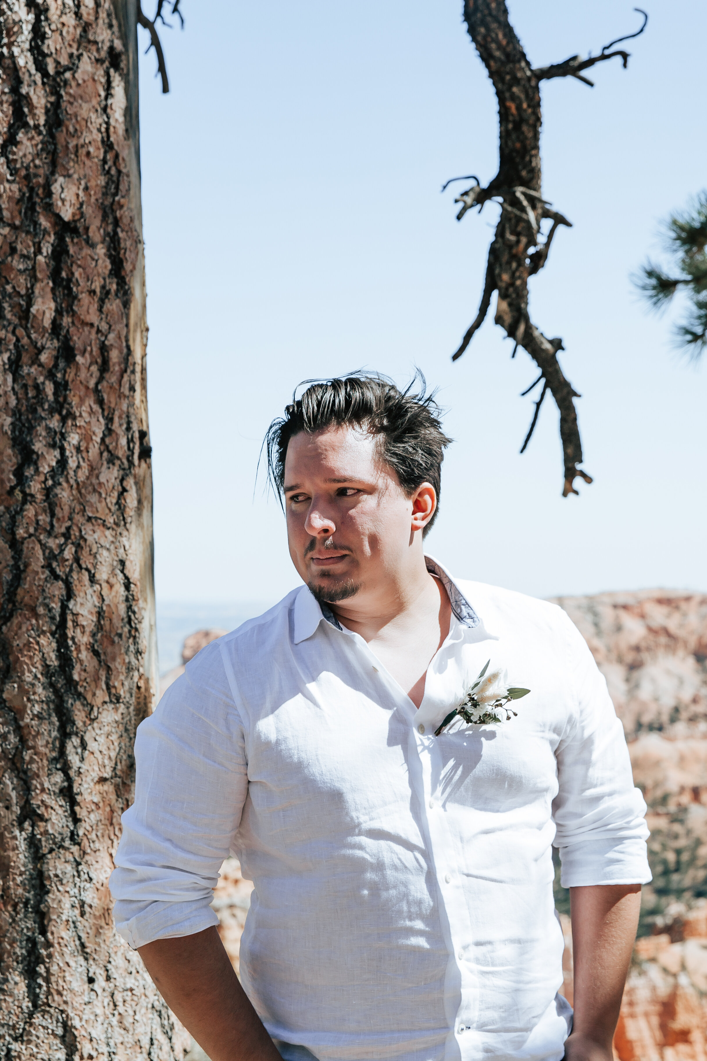 Bryce Canyon National Park wedding photographer southern Utah elopement photographer Moab elopement Zion wedding photographer #utahphotographer #elopementphotographer red rock wedding groom