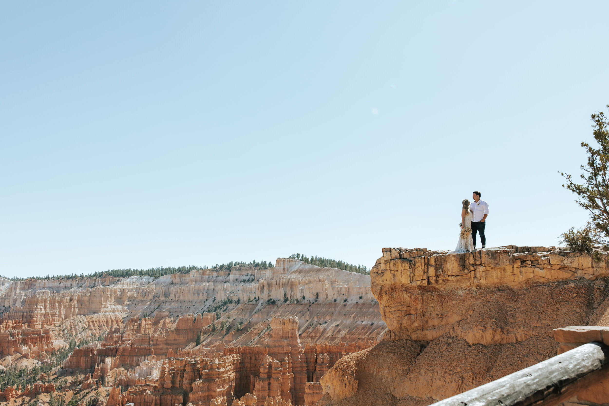 Bryce Canyon National Park wedding photographer southern Utah elopement photographer Moab elopement Zion wedding photographer #utahphotographer #elopementphotographer red rock wedding cliff