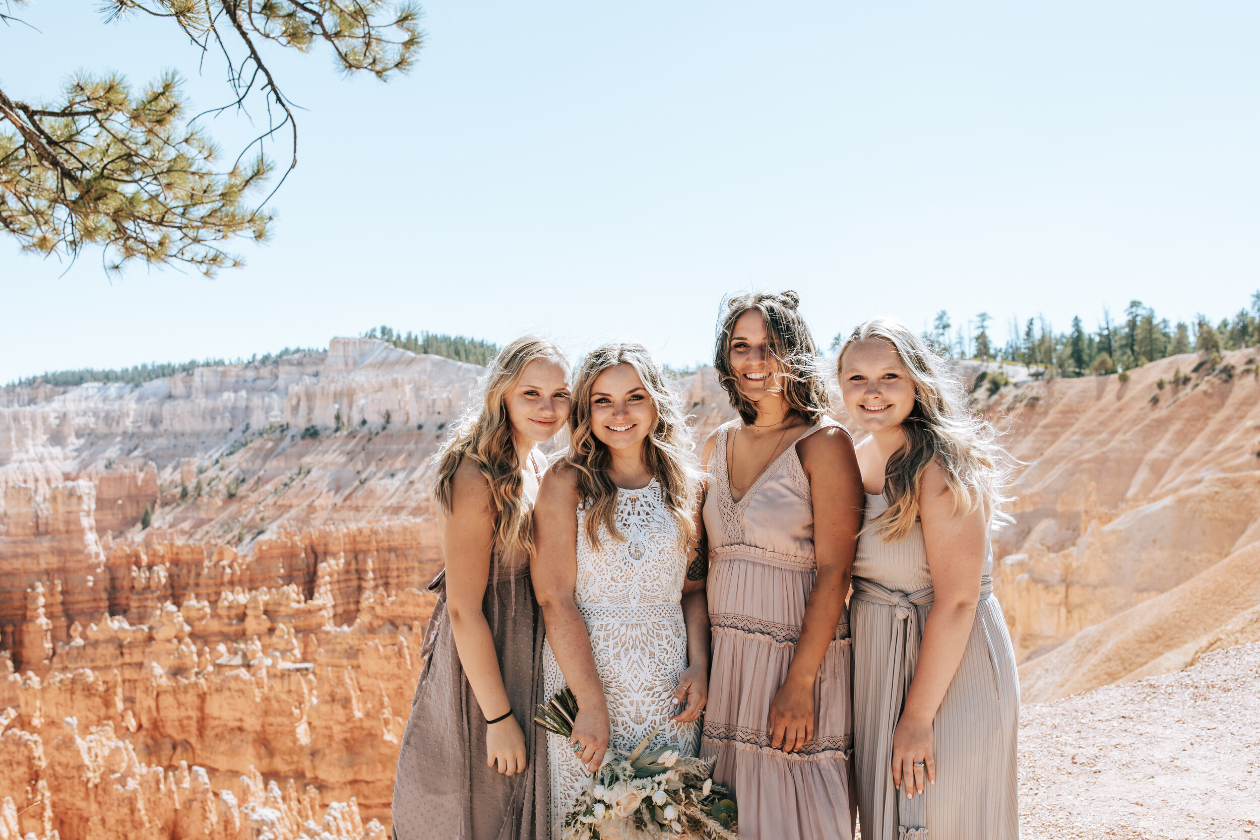 Bryce Canyon National Park wedding photographer southern Utah elopement photographer Moab elopement Zion wedding photographer #utahphotographer #elopementphotographer red rock wedding bridesmaids