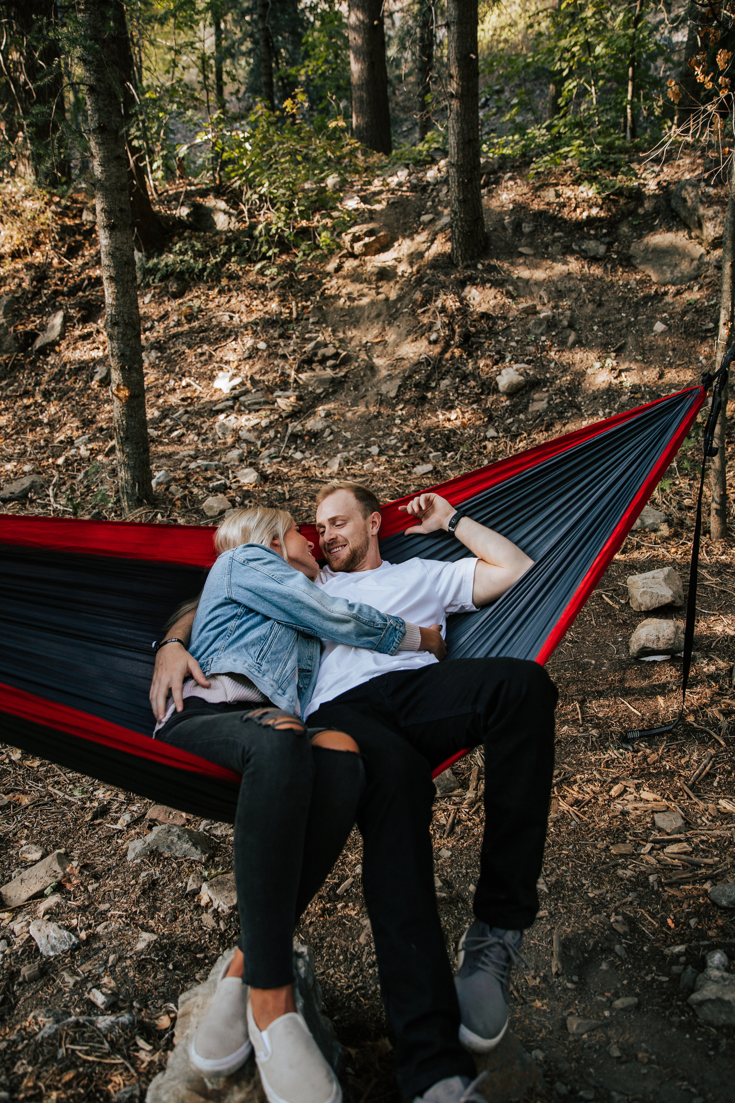 Adventure couples shoot camping in the mountains forest engagements Utah engagement photographer Utah couples photographer Oregon photographer PNW campfire tent hammocking