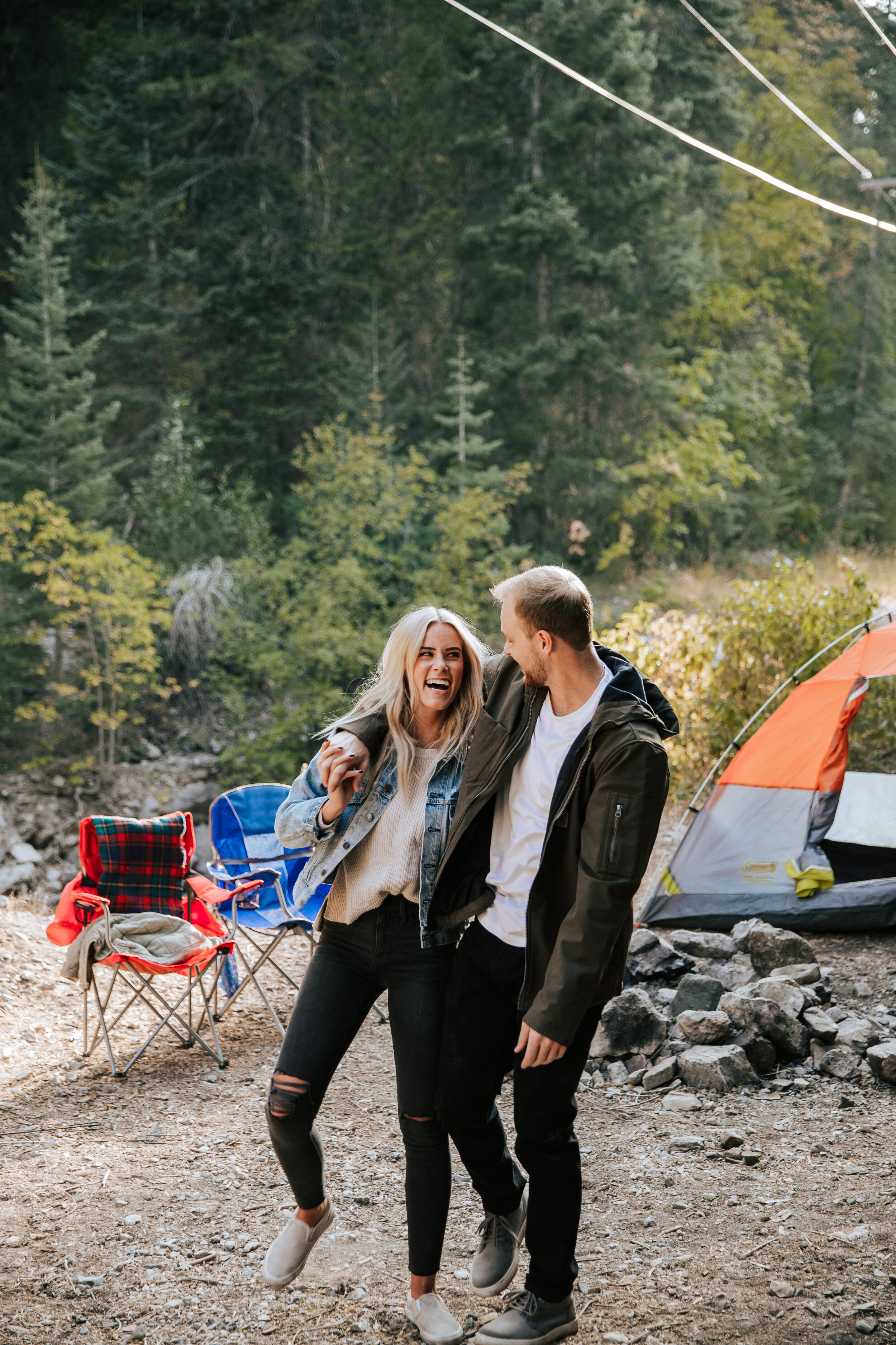 Adventure couples shoot camping in the mountains forest engagements Utah engagement photographer Utah couples photographer Oregon photographer PNW campfire tent