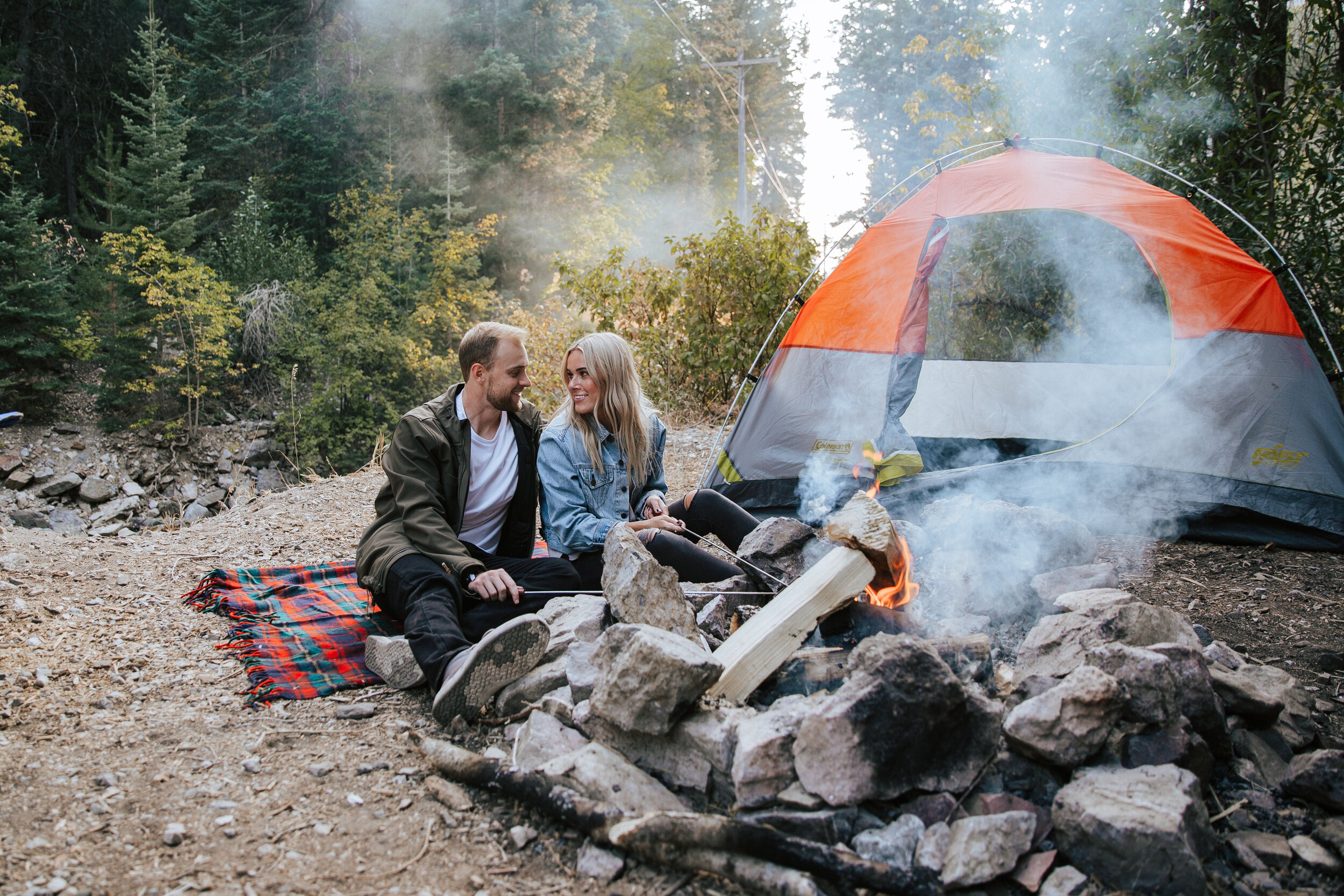 Adventure couples shoot camping in the mountains forest engagements Utah engagement photographer Utah couples photographer Oregon photographer PNW campfire tent
