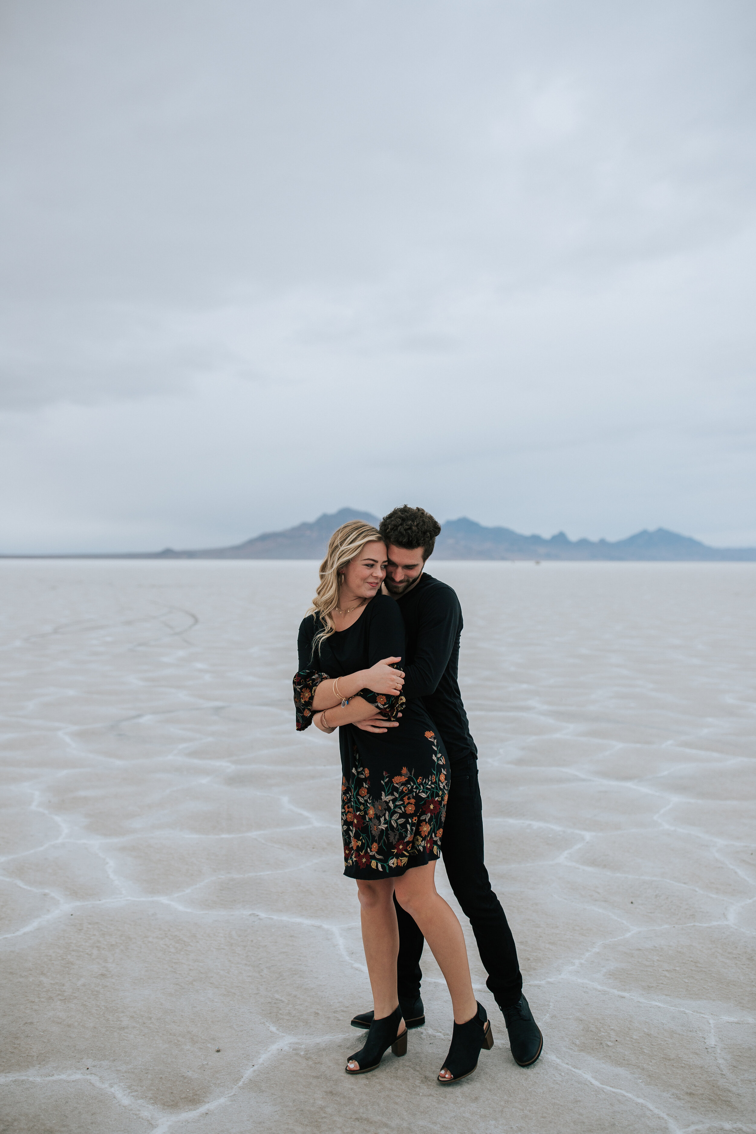 Bonneville Salt Flats engagement session Utah elopement photographer wedding photography playful adventurous engagements couple shoot #utahphotographer #engagements