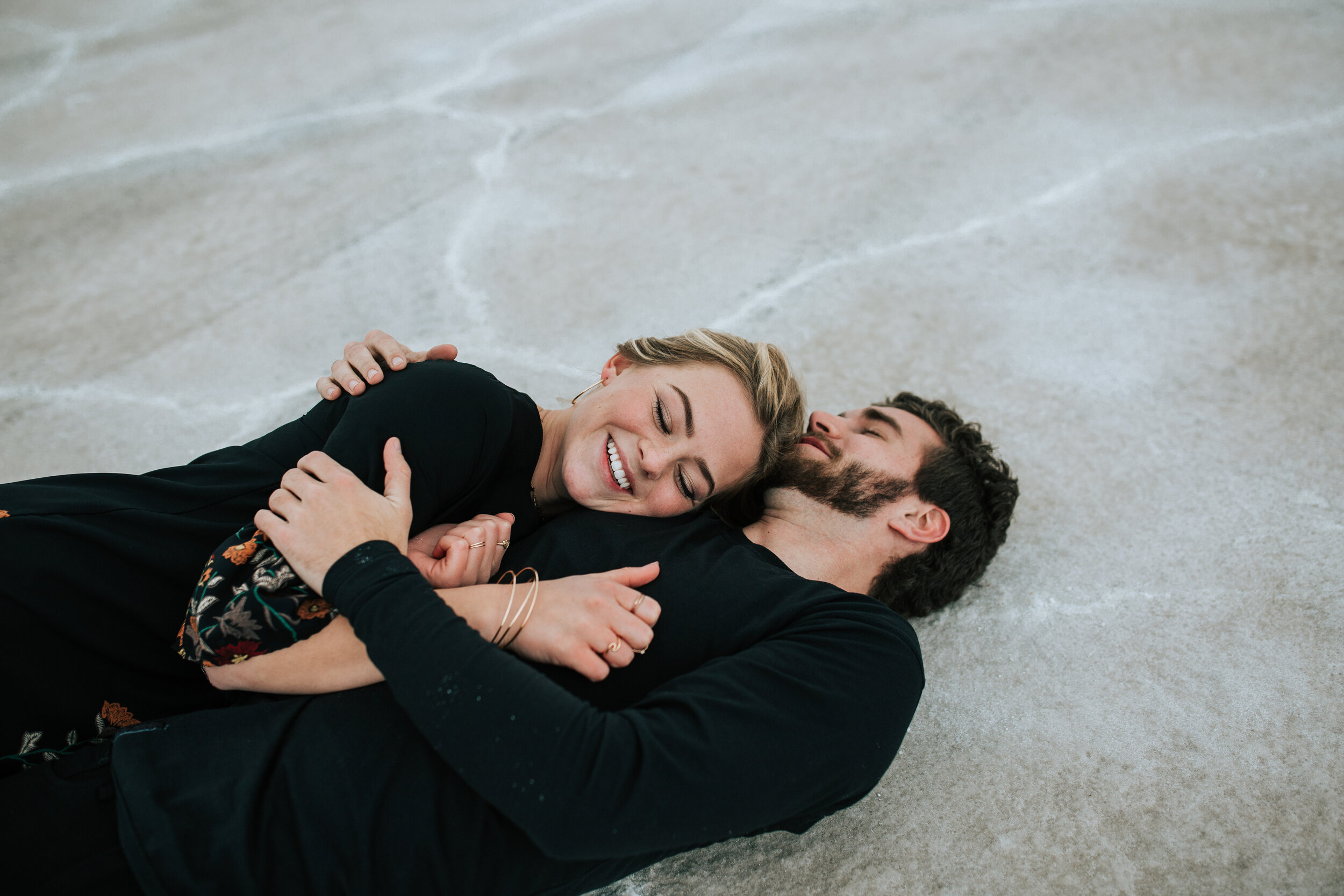 Bonneville Salt Flats engagement session Utah elopement photographer wedding photography playful adventurous engagements couple shoot #utahphotographer #engagements