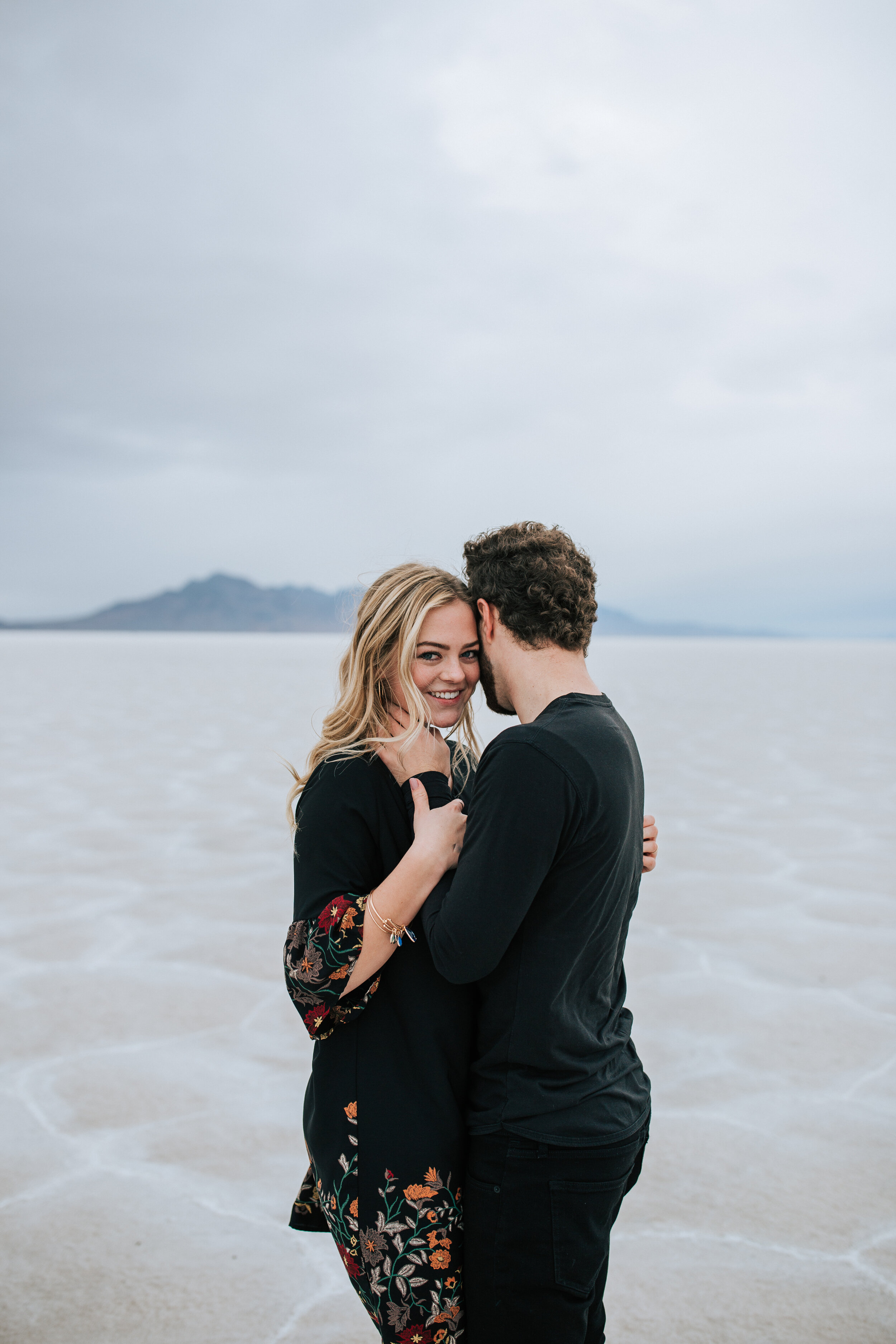 Bonneville Salt Flats engagement session Utah elopement photographer wedding photography playful adventurous engagements couple shoot #utahphotographer #engagements