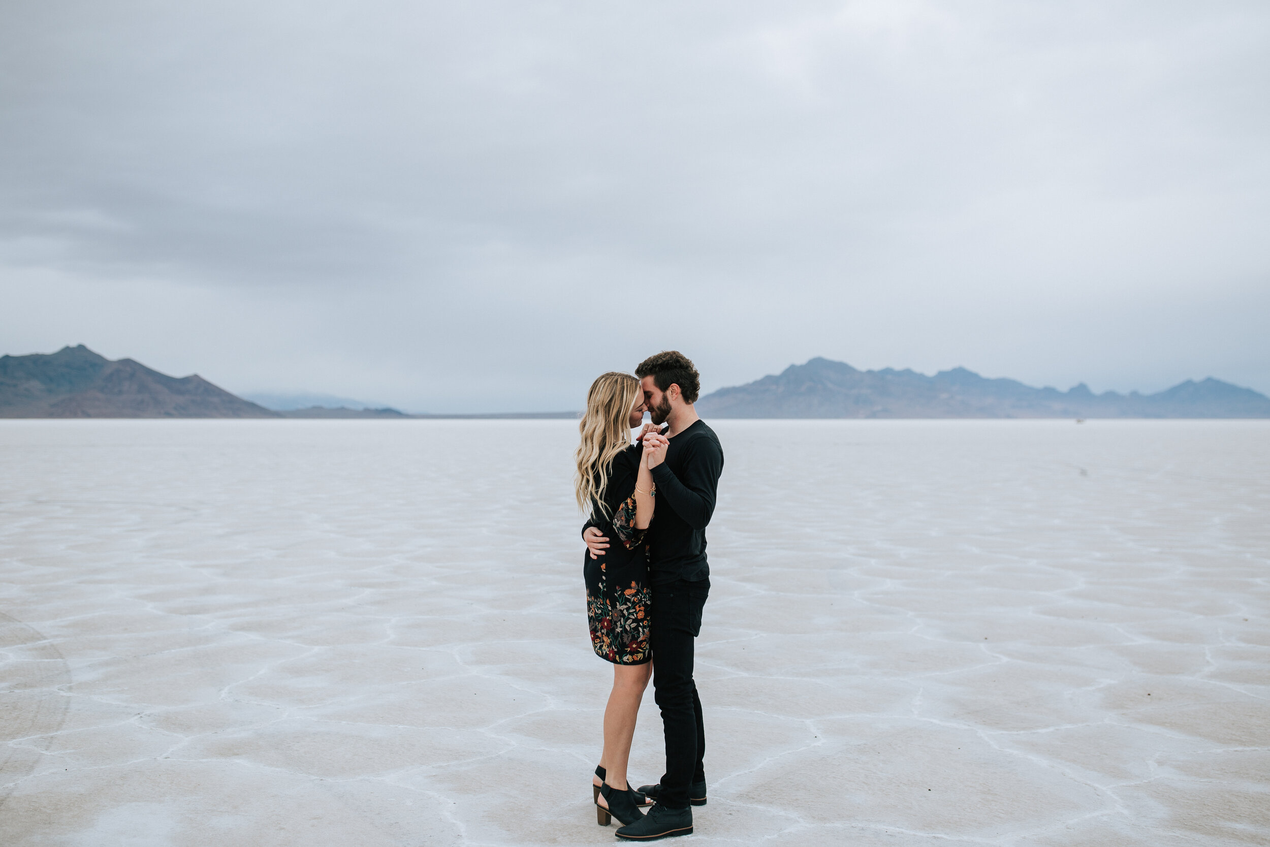 Bonneville Salt Flats engagement session Utah elopement photographer wedding photography playful adventurous engagements couple shoot #utahphotographer #engagements