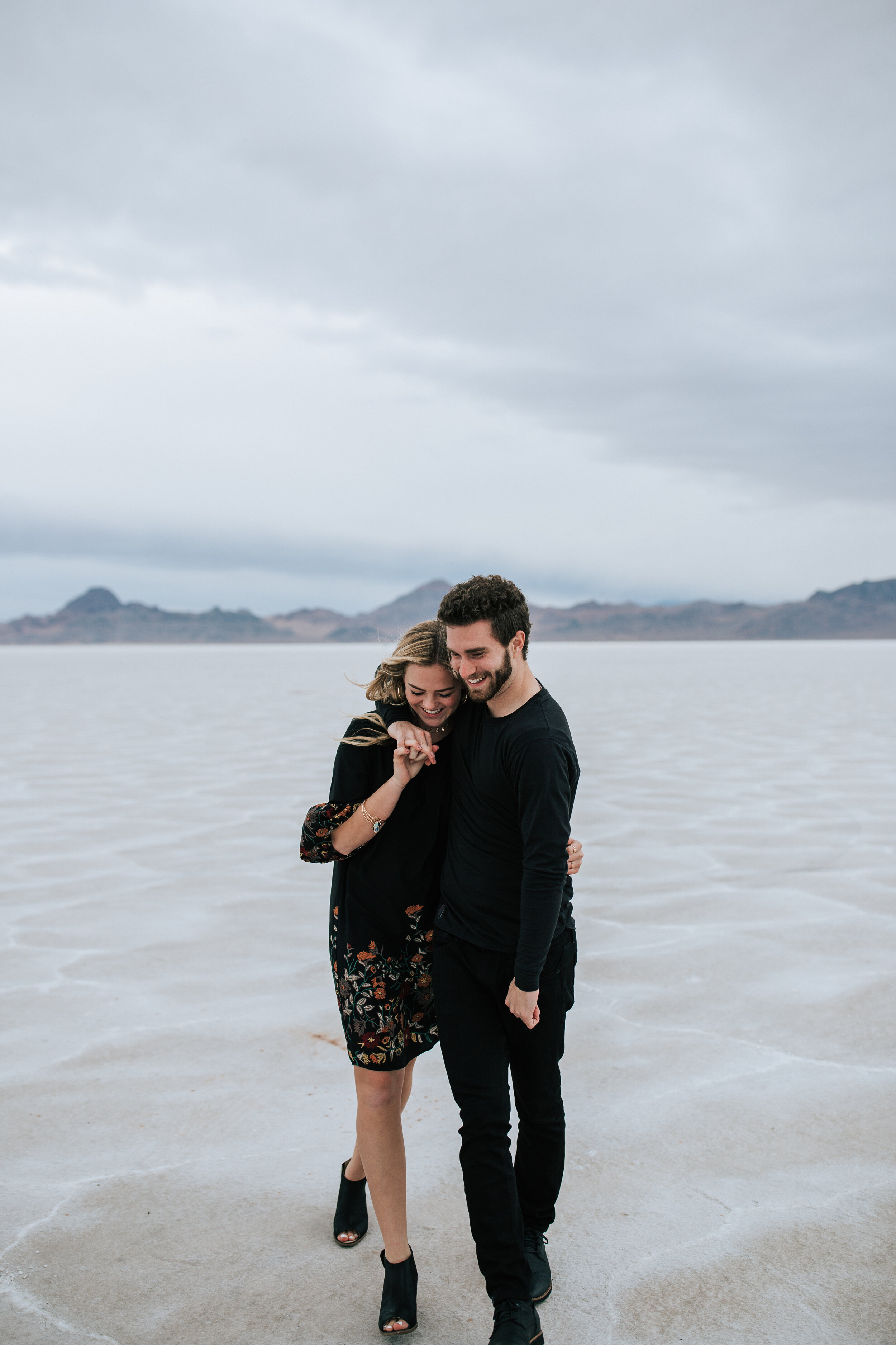 Bonneville Salt Flats engagement session Utah elopement photographer wedding photography playful adventurous engagements couple shoot #utahphotographer #engagements