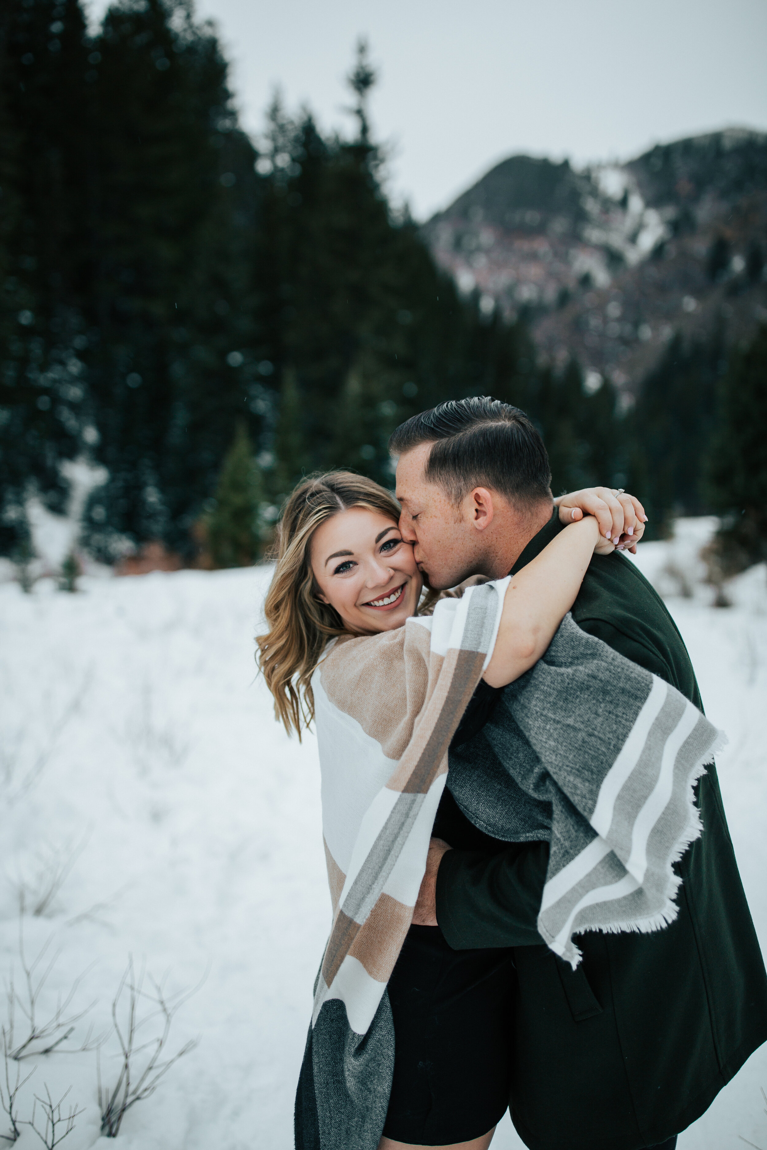 Winter couple photos in the mountains Park City Utah Salt Lake City Utah engagement session #utahengagements #engagementsession #parkcity
