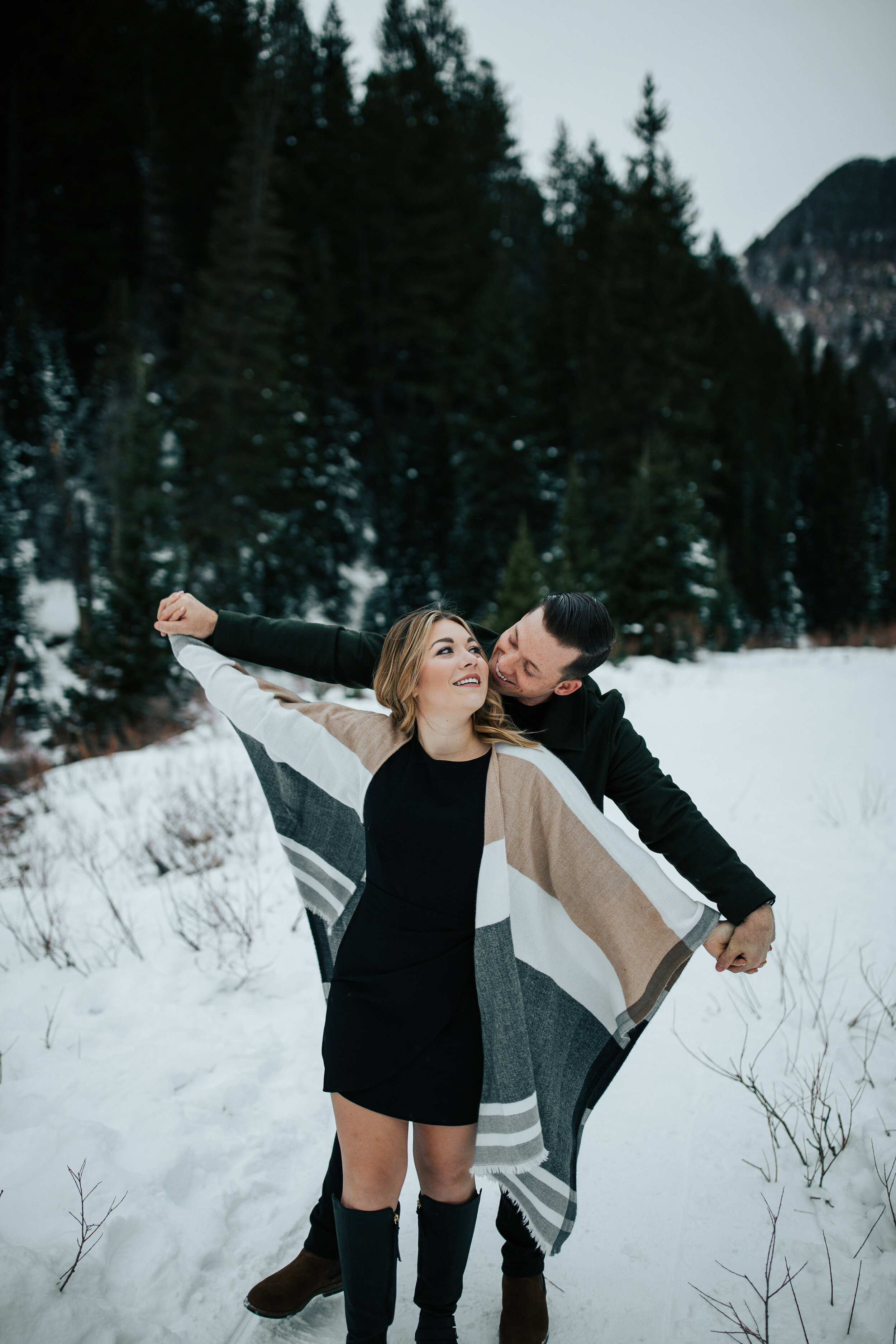 Park City Utah winter engagement shoot engaged couple photoshoot in the Utah mountains in the winter #utahphotographer #utahengagements #engagements