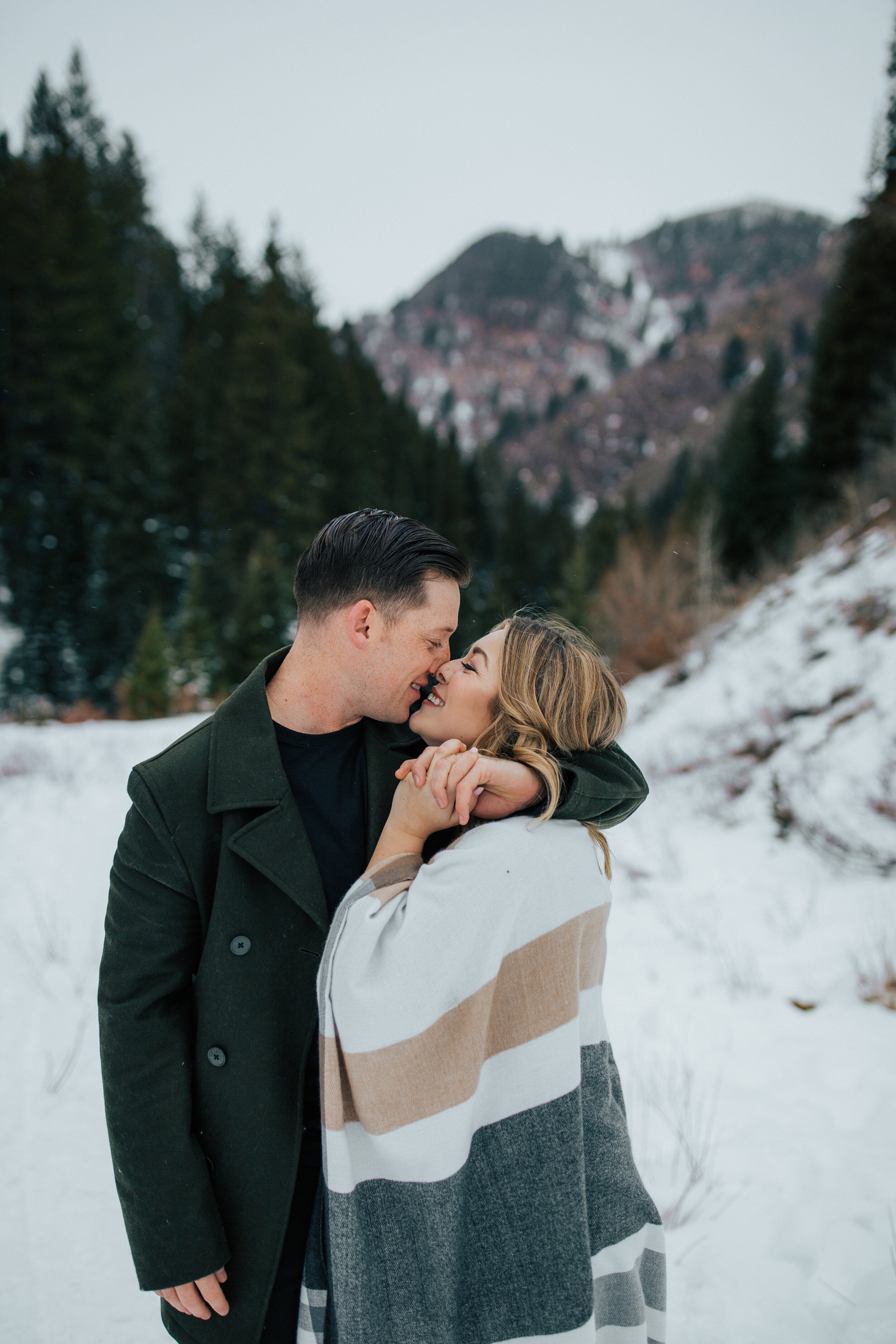 Winter engagement session in Utah mountains Big Cottonwood Canyon engagement shoot #utahphotographer #winterengagements