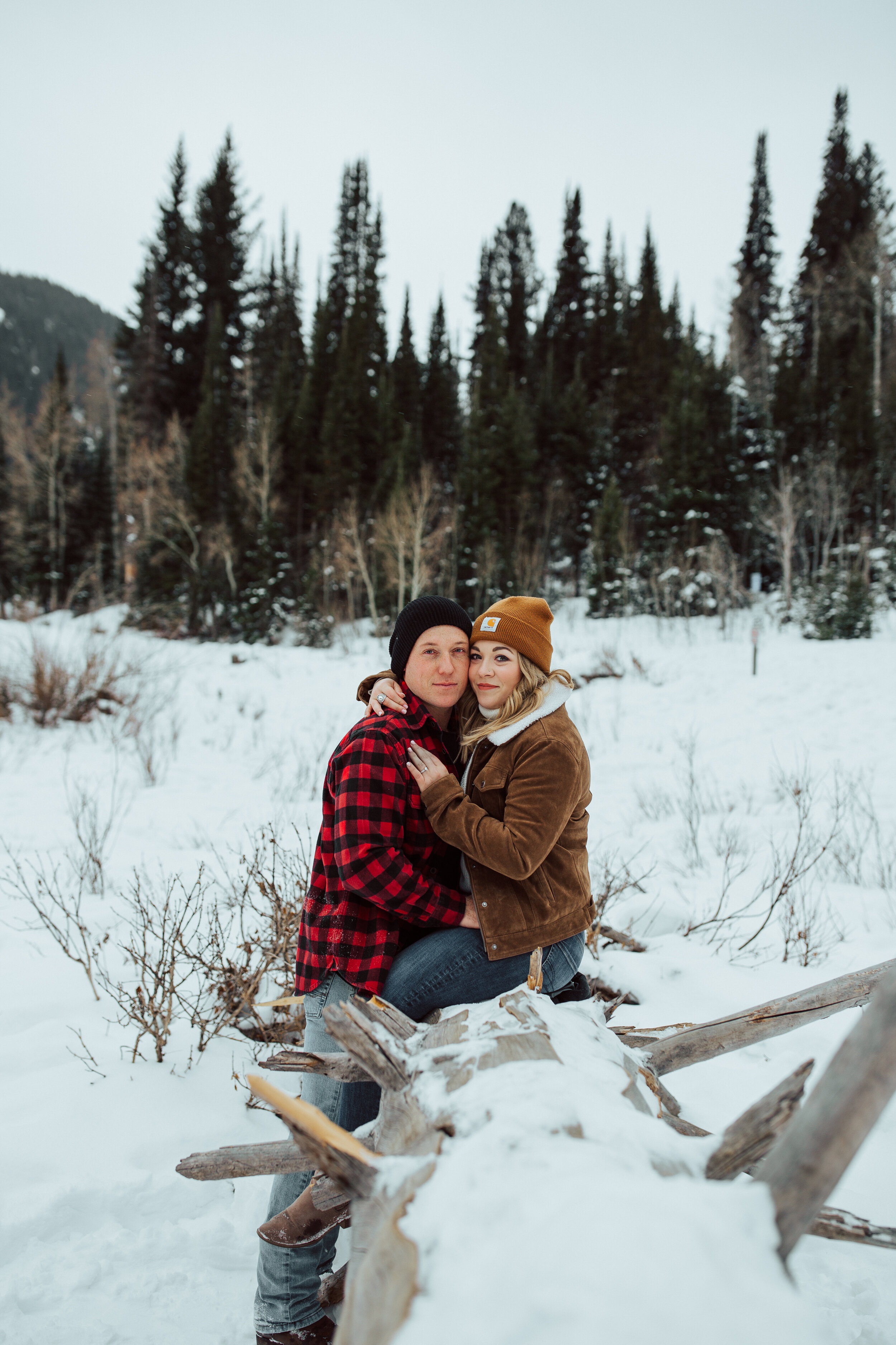 Winter engagement session in Utah mountains Big Cottonwood Canyon engagement shoot #utahphotographer #winterengagements Utah winter couple photoshoot